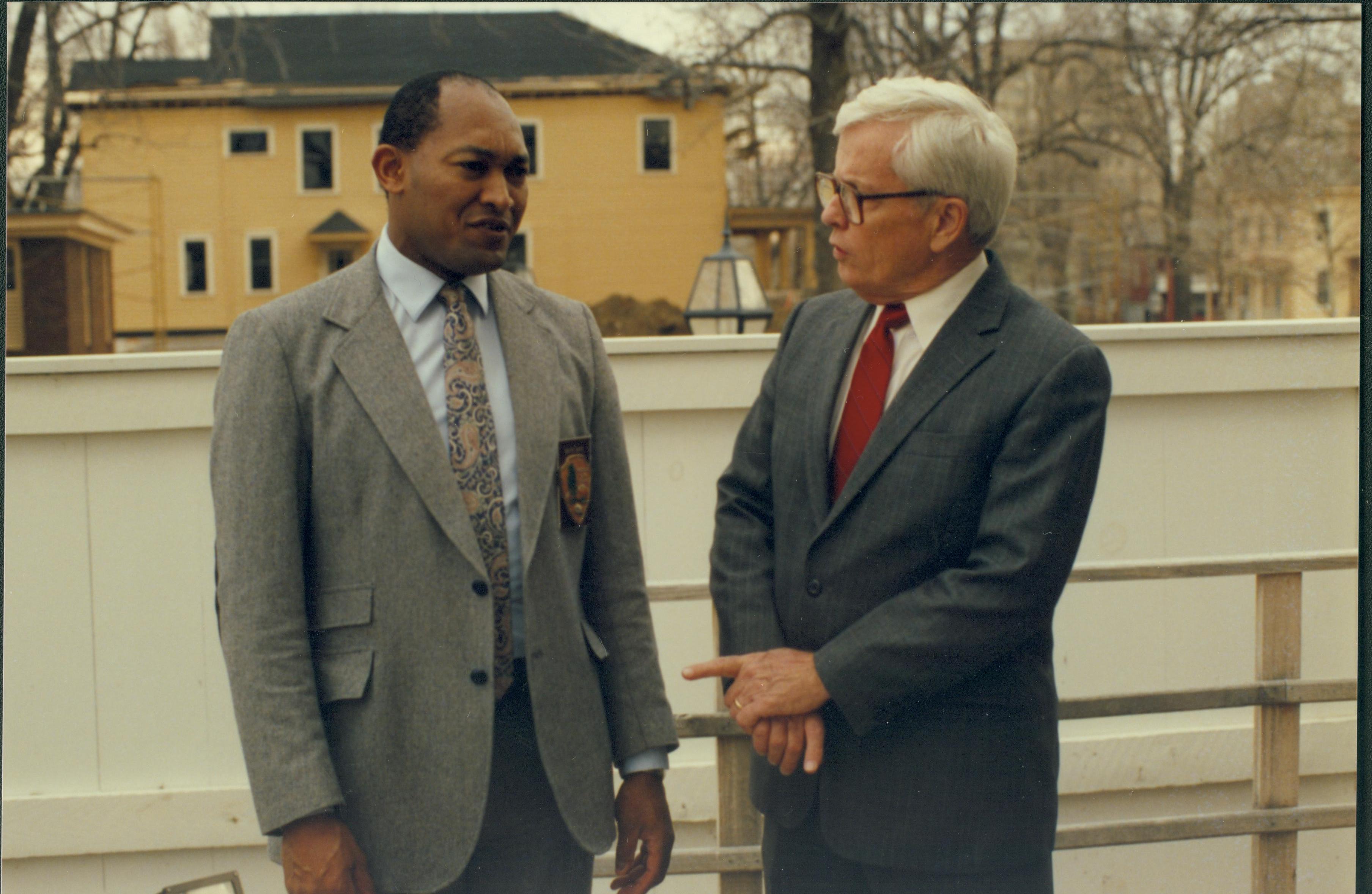 Two men conversing. Lincoln Home NHS- Paul Findley Recognition Award, 4314 Finley, award