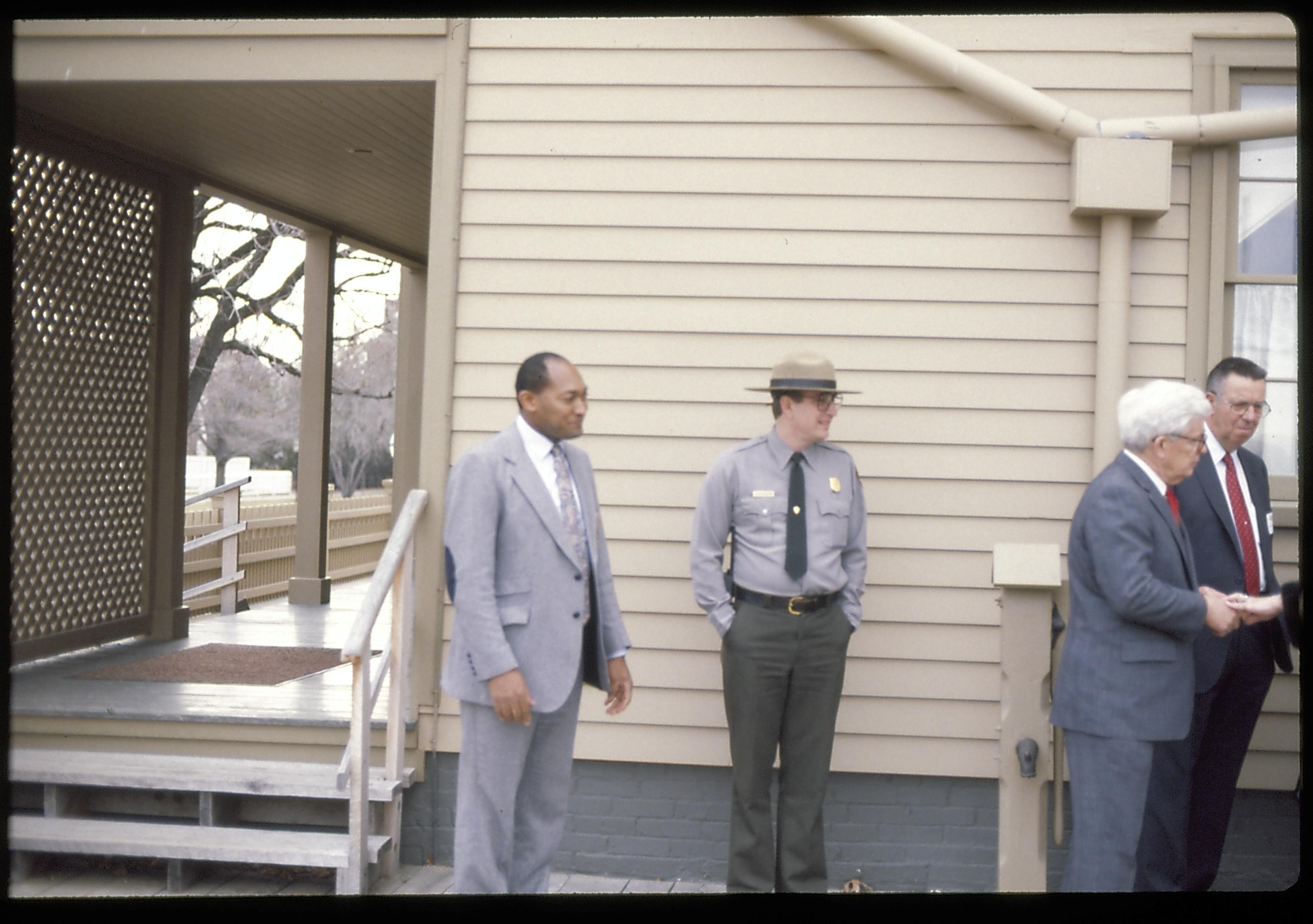 Men standing at rear of home. Lincoln Home NHS- Paul Findley Recognition Award Finley, award, tour