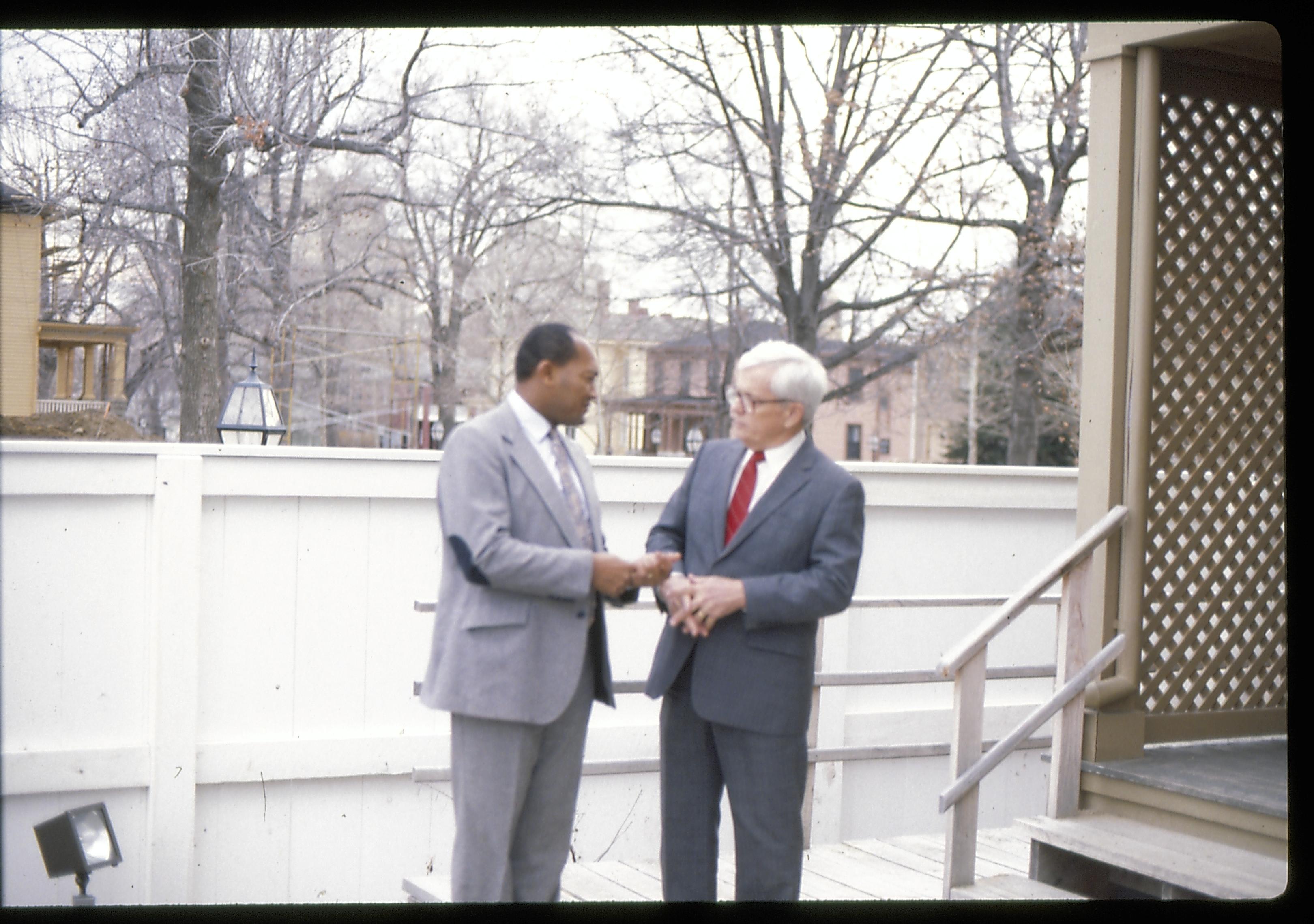 Two men conversing. Lincoln Home NHS- Paul Findley Recognition Award Finley, award, fence