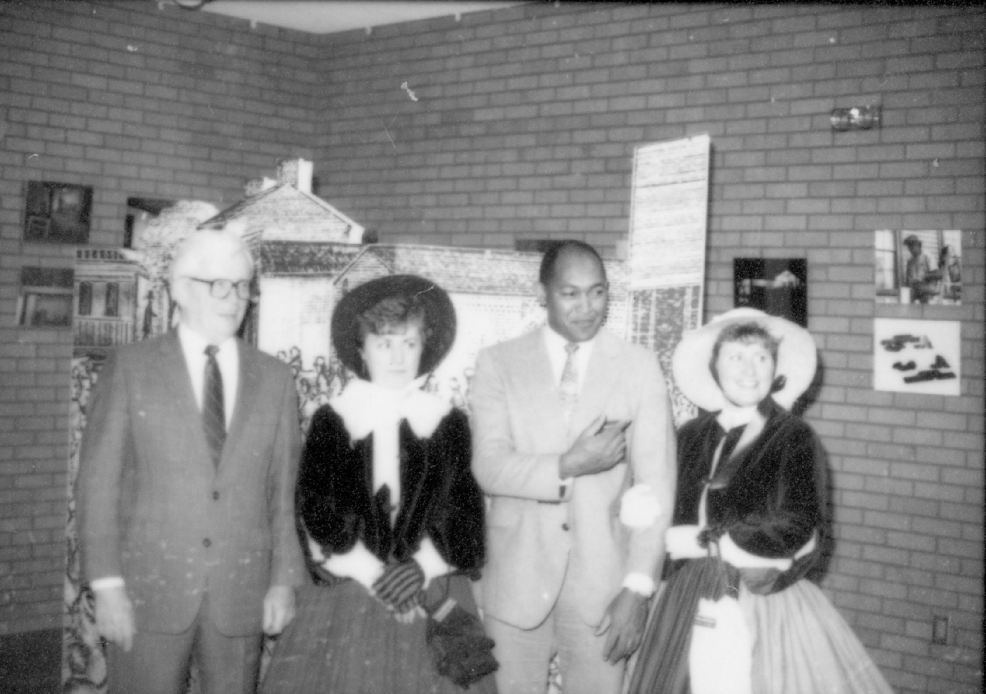 People standing for formal photograph (two in period dress). Lincoln Home NHS- Paul Findley Recognition Award Finley, award