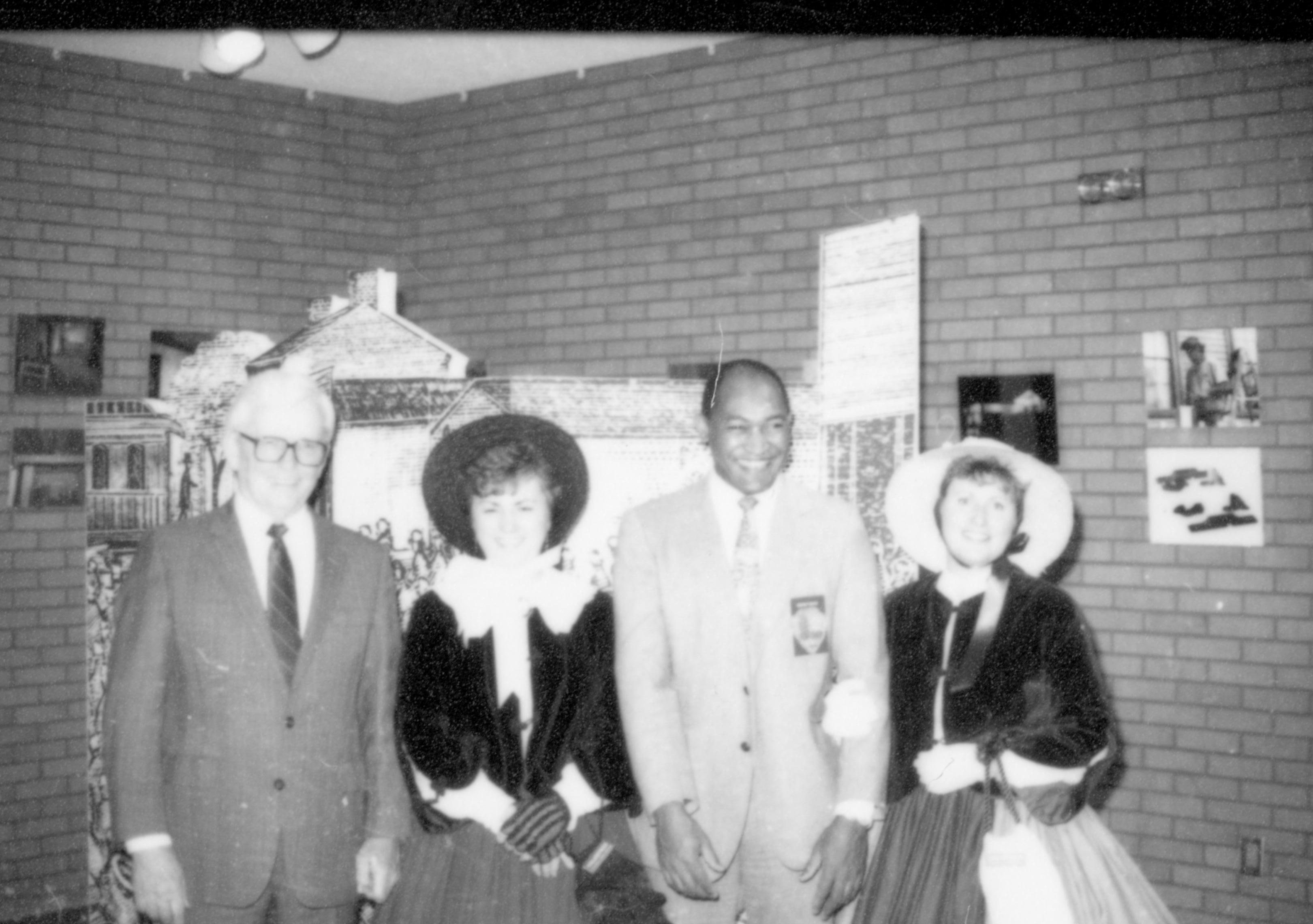 People standing for formal photograph (two in period dress). Lincoln Home NHS- Paul Findley Recognition Award Finley, award
