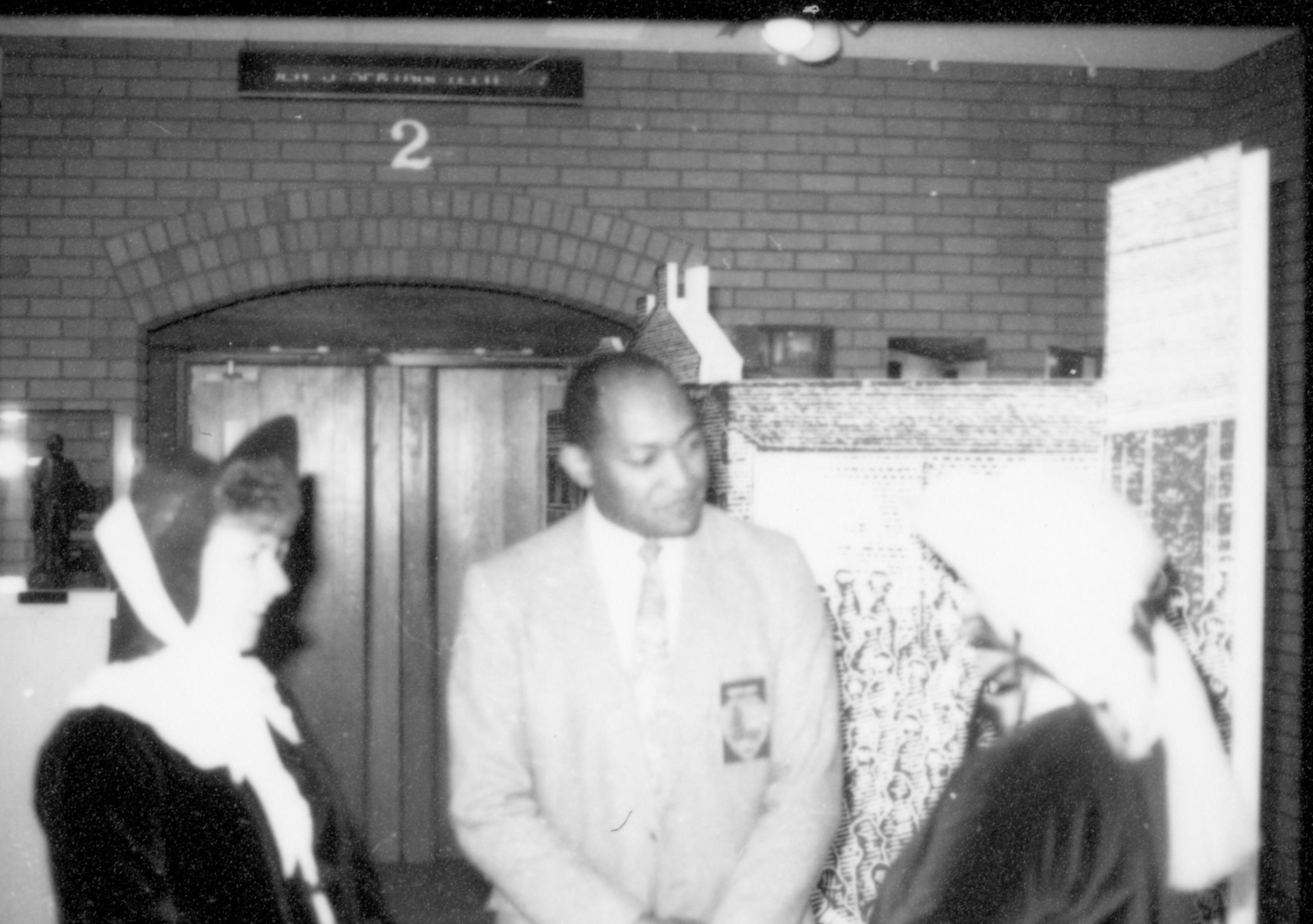 Man and two ladies in period dress. Lincoln Home NHS- Paul Findley Recognition Award Finley, award