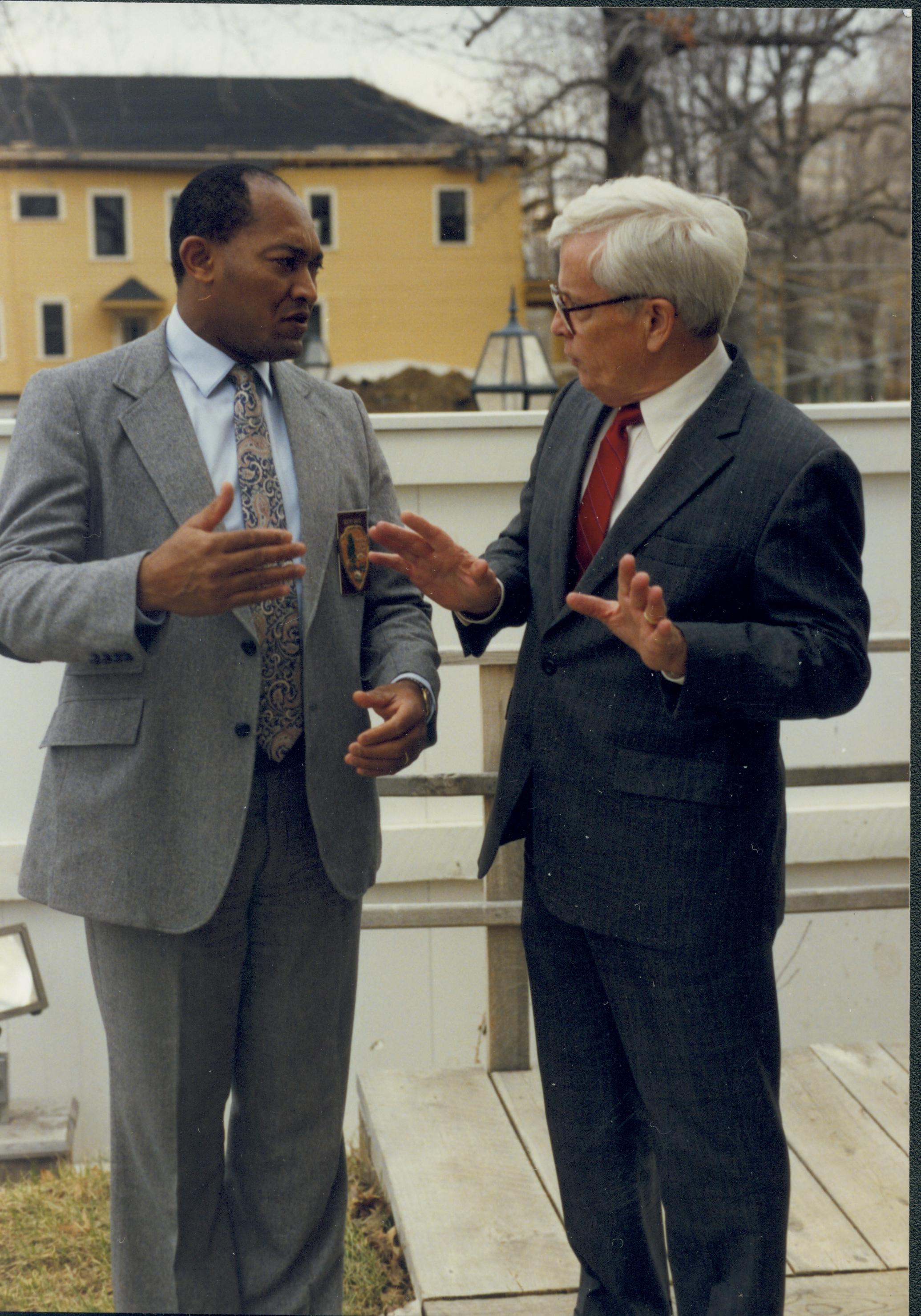 Two men conversing. Lincoln Home NHS- Paul Findley Recognition Award, 4314 Finley, award