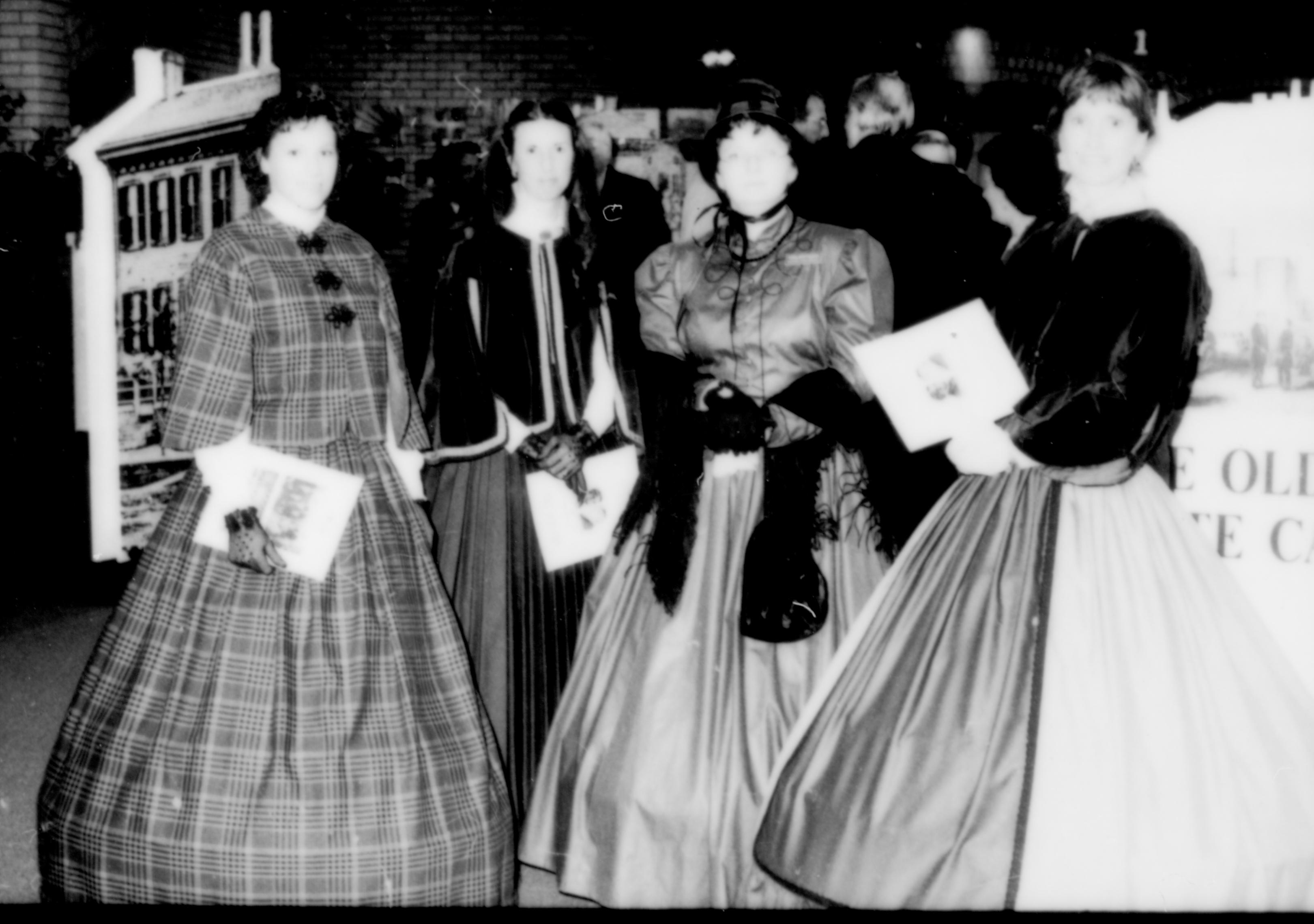 Four ladies in period dress. Lincoln Home NHS- Paul Findley and Michel VIP visit, 121 Finley, Michel, visit, reception, period dress