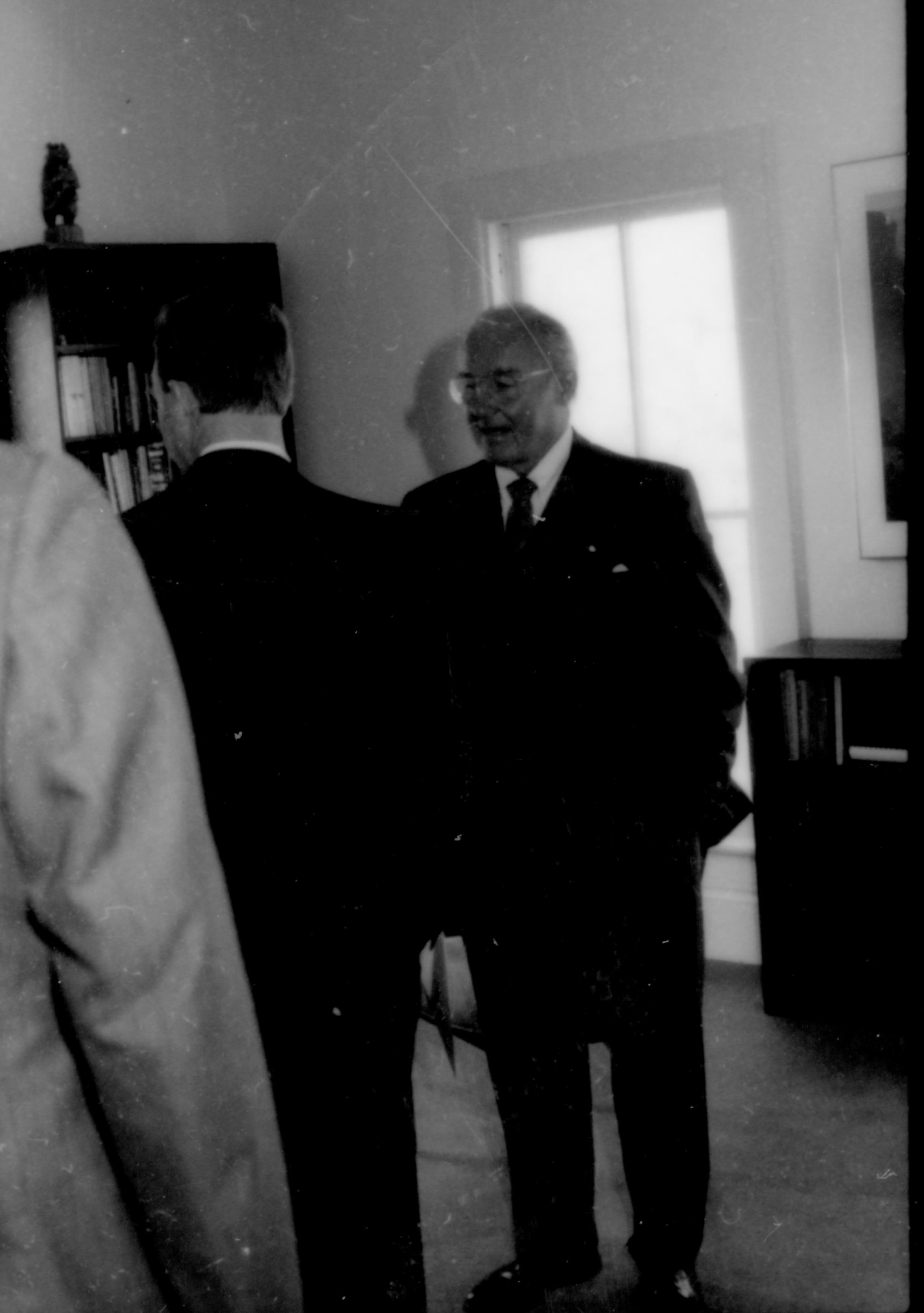 Men standing in front of window. Lincoln Home NHS- Paul Findley and Michel VIP visit, 115 Finley, Michel, tour, visit