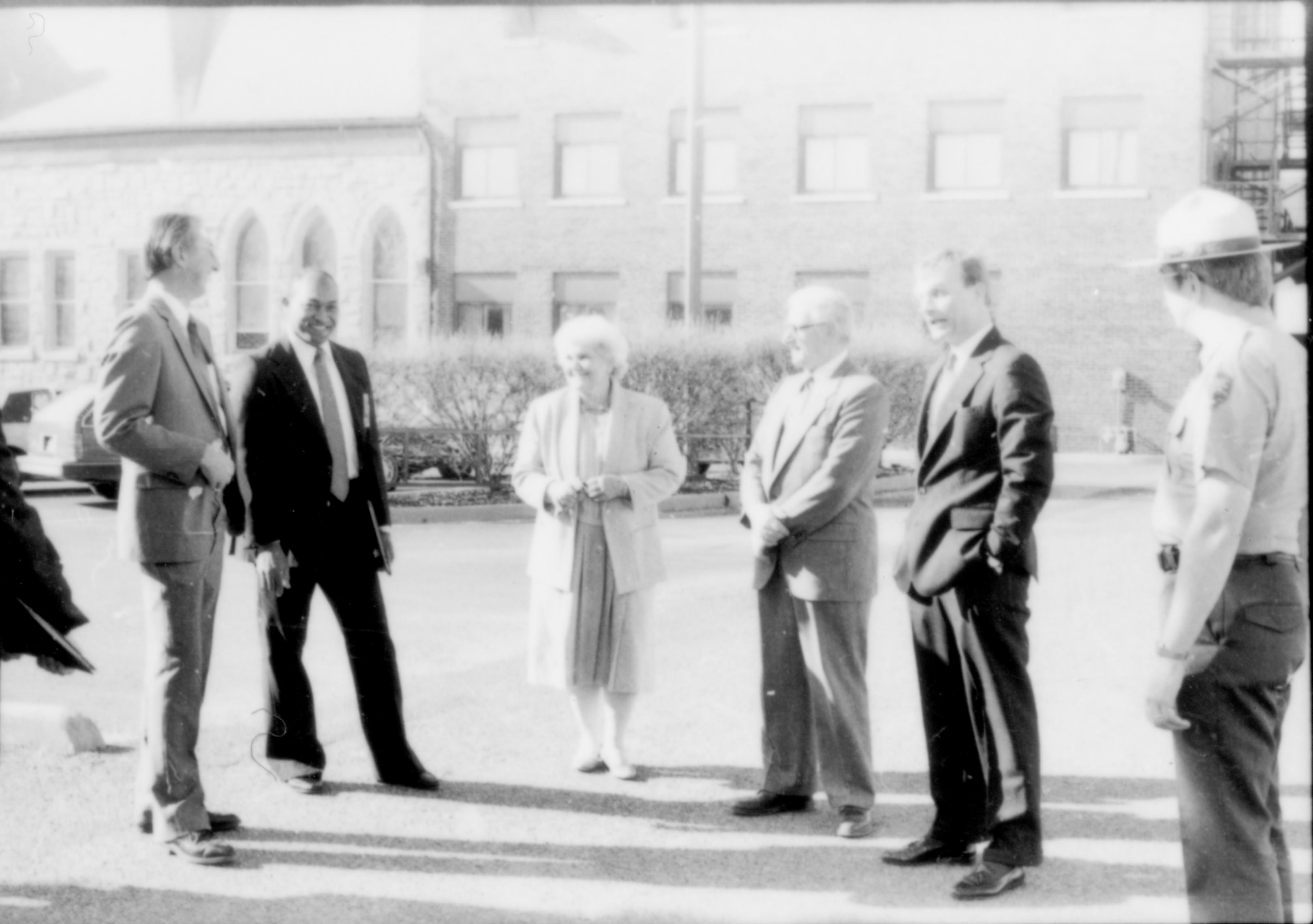 Five people and a Ranger standing in street. Lincoln Home NHS- Paul Findley and Michel VIP visit, 123 Finley, Michel, visit
