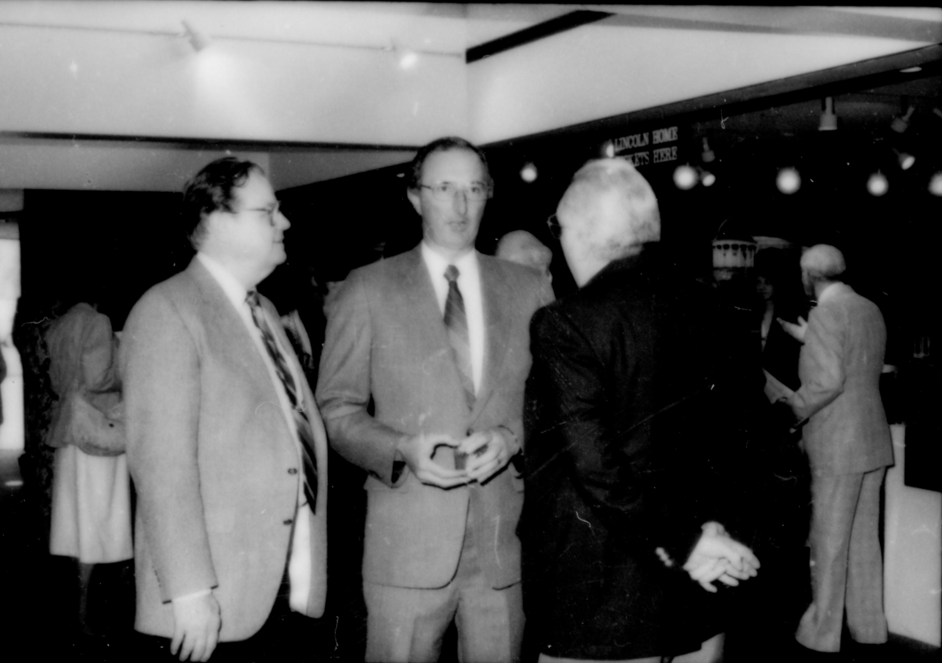 Three men standing, talking. Lincoln Home NHS- Paul Findley and Michel VIP visit, 125 Finley, Michel, visit