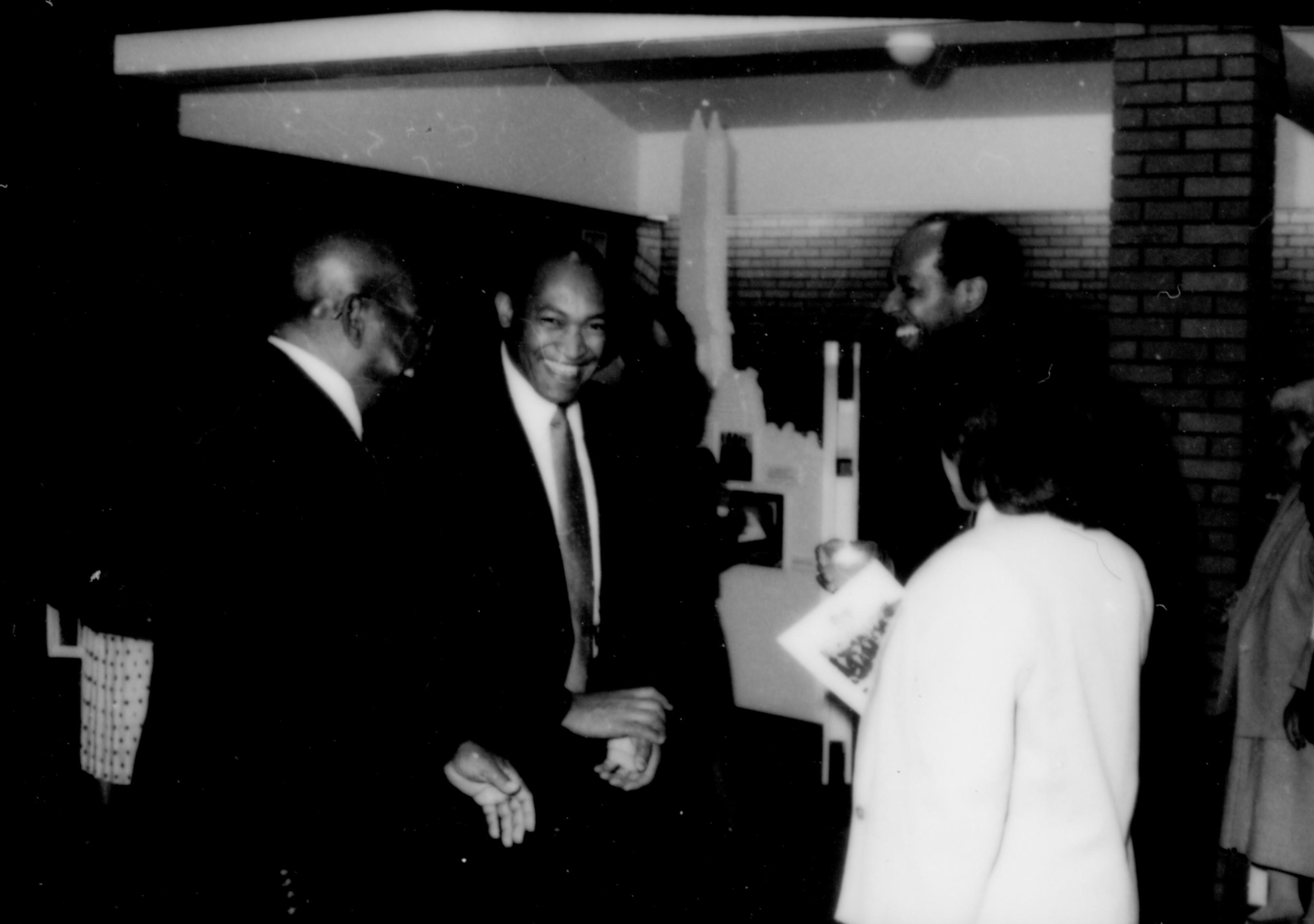 Three men talking to lady in white coat. Lincoln Home NHS- Paul Findley and Michel VIP visit, 125 Finley, Michel, visit