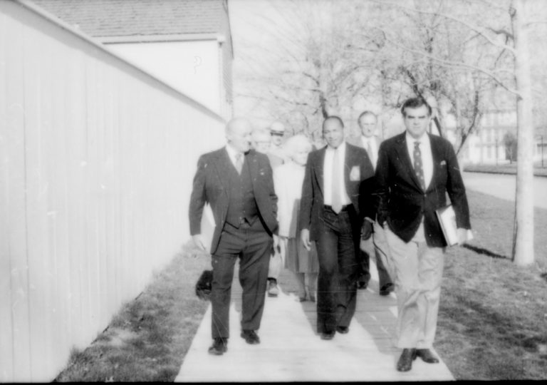 Men walking down board walk beside home. Lincoln Home NHS- Paul Findley and Michel VIP visit, 127 Finley, Michel, visit, tour