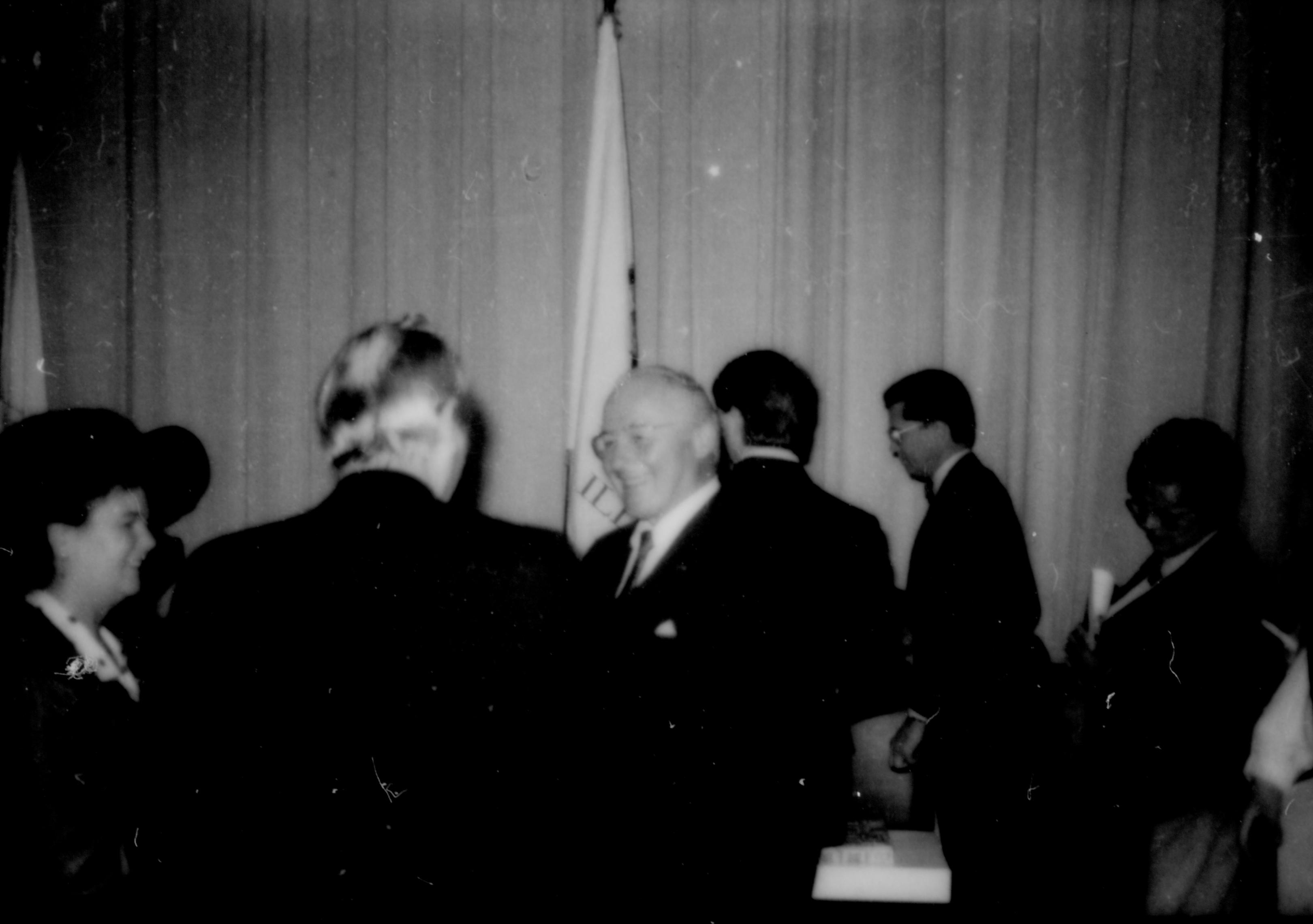 Man & lady speaking with a man, others in background. Lincoln Home NHS- Paul Findley and Michel VIP visit, 129 Finley, Michel, visit, reception