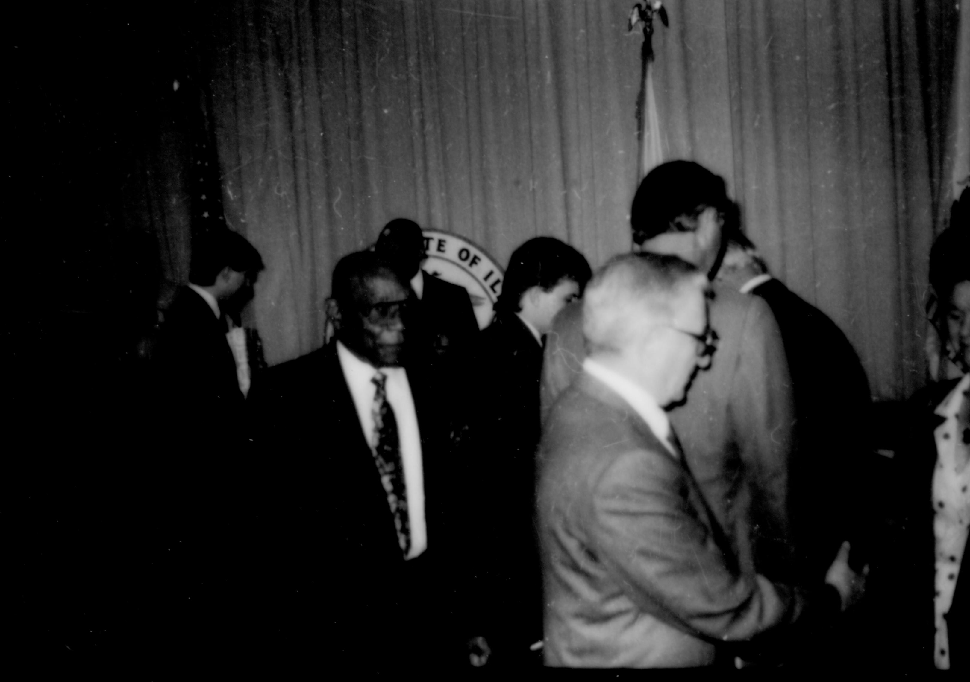 People gathered in front of curtain in VC.. Lincoln Home NHS- Paul Findley and Michel VIP visit, 129 Finley, Michel, visit, reception