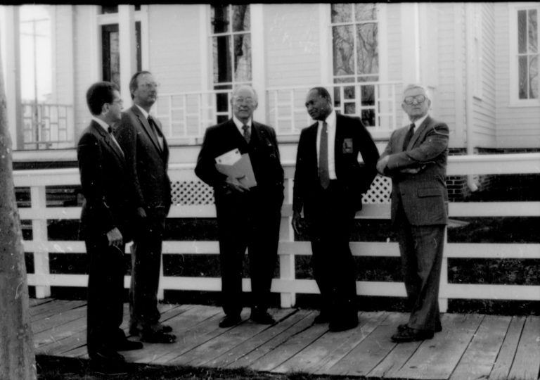 Men standing by white fence. Lincoln Home NHS- Paul Findley and Michel VIP visit, 115 Finley, Michel, tour, visit