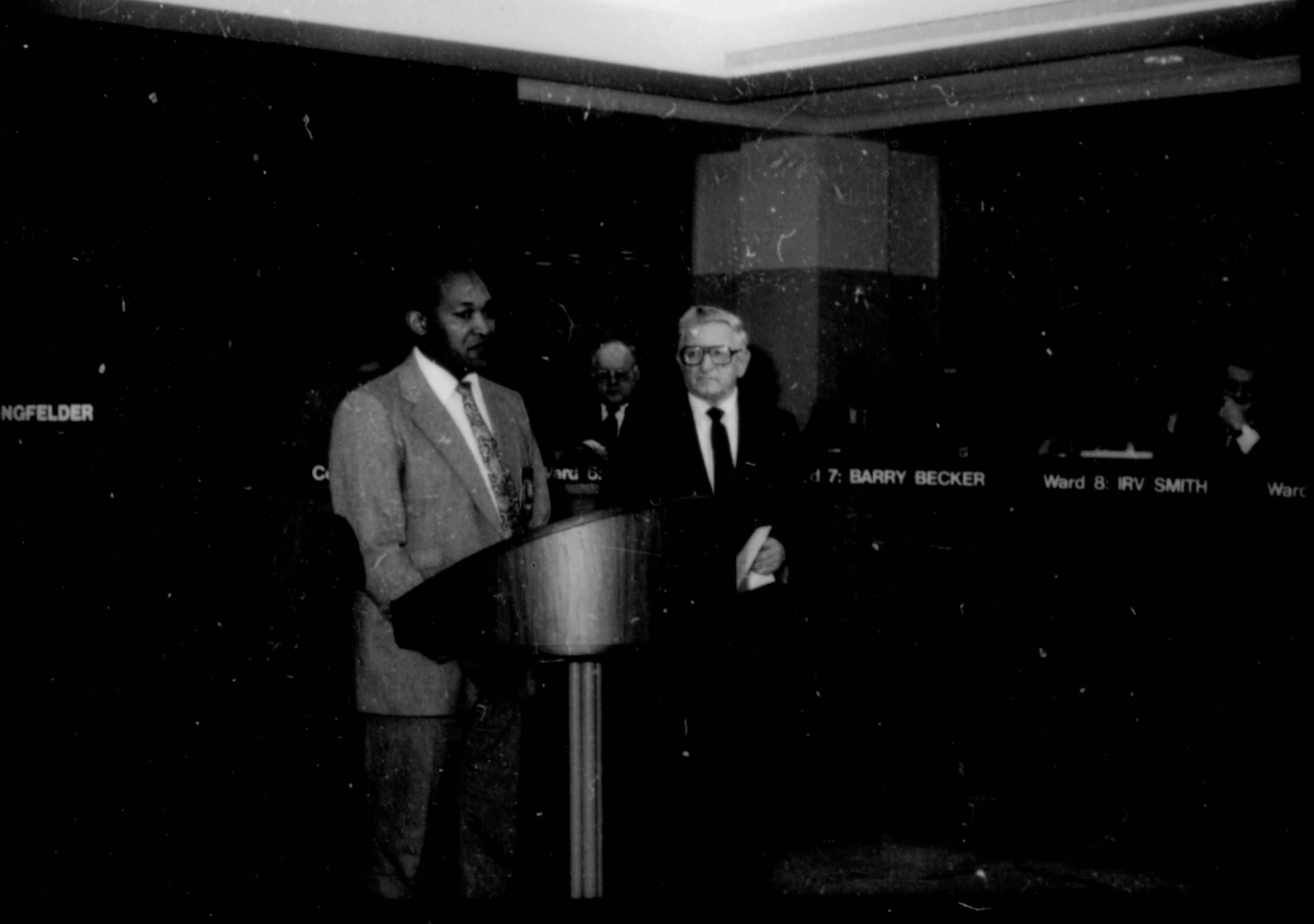 Two men standing at podium. Lincoln Home NHS- City Council Ollie Christmas Award, 133 Award, program