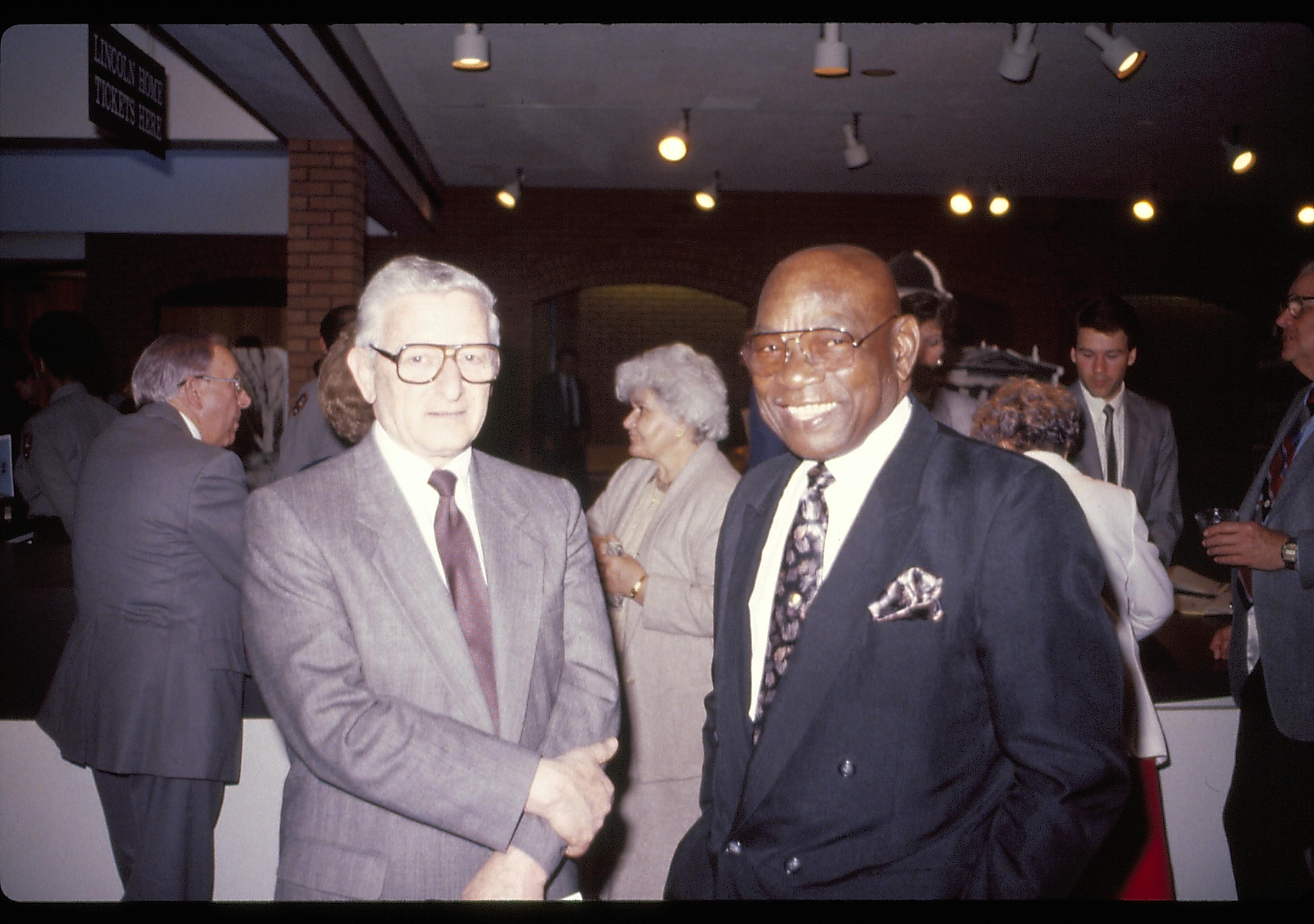 Two men in VC posing for picture. Lincoln Home NHS- VIP Findley and Michels Visit award, visit, ceremony