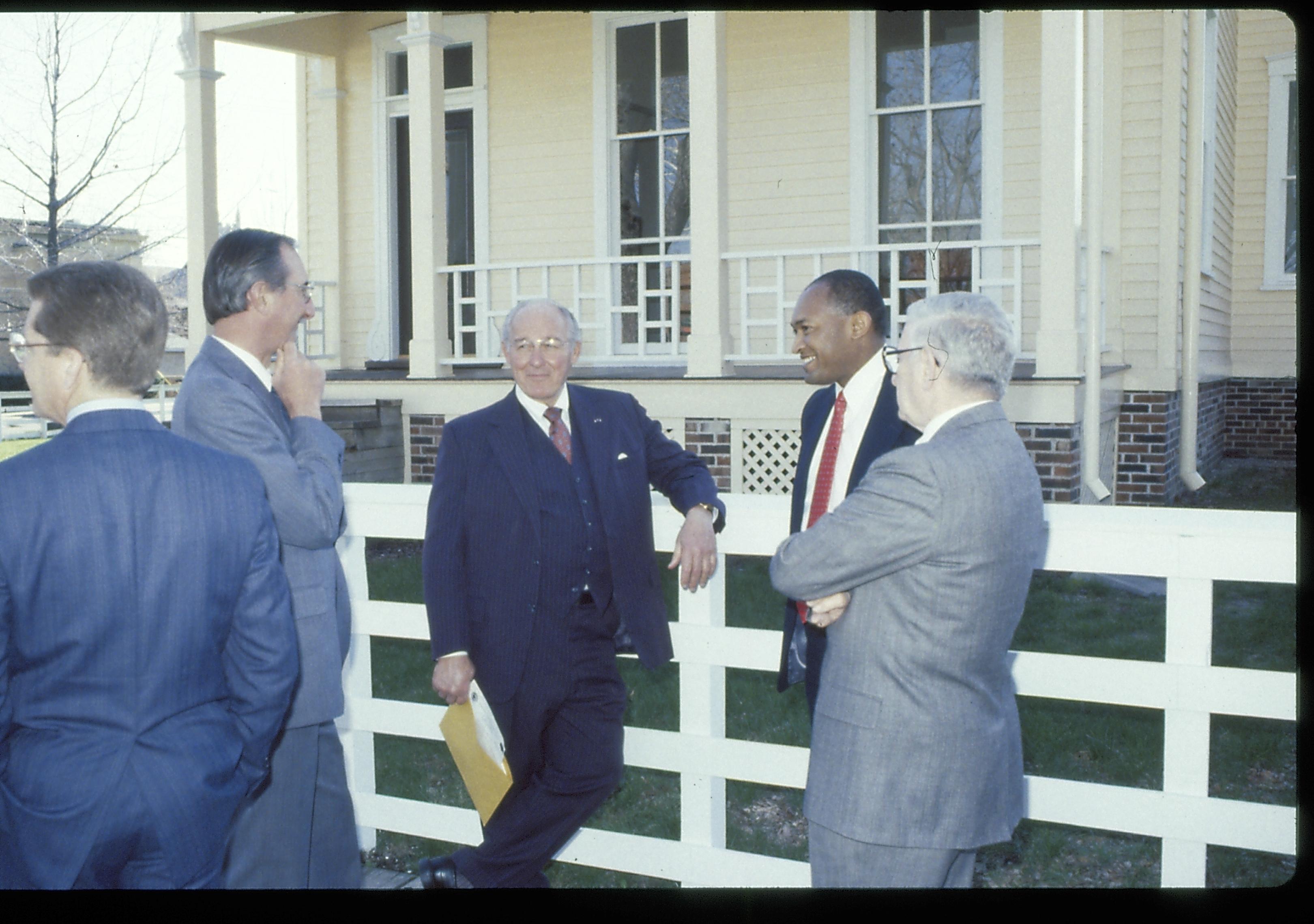 Five men standing at white fence. Lincoln Home NHS- VIP Findley and Michel Visit award, visit, tour