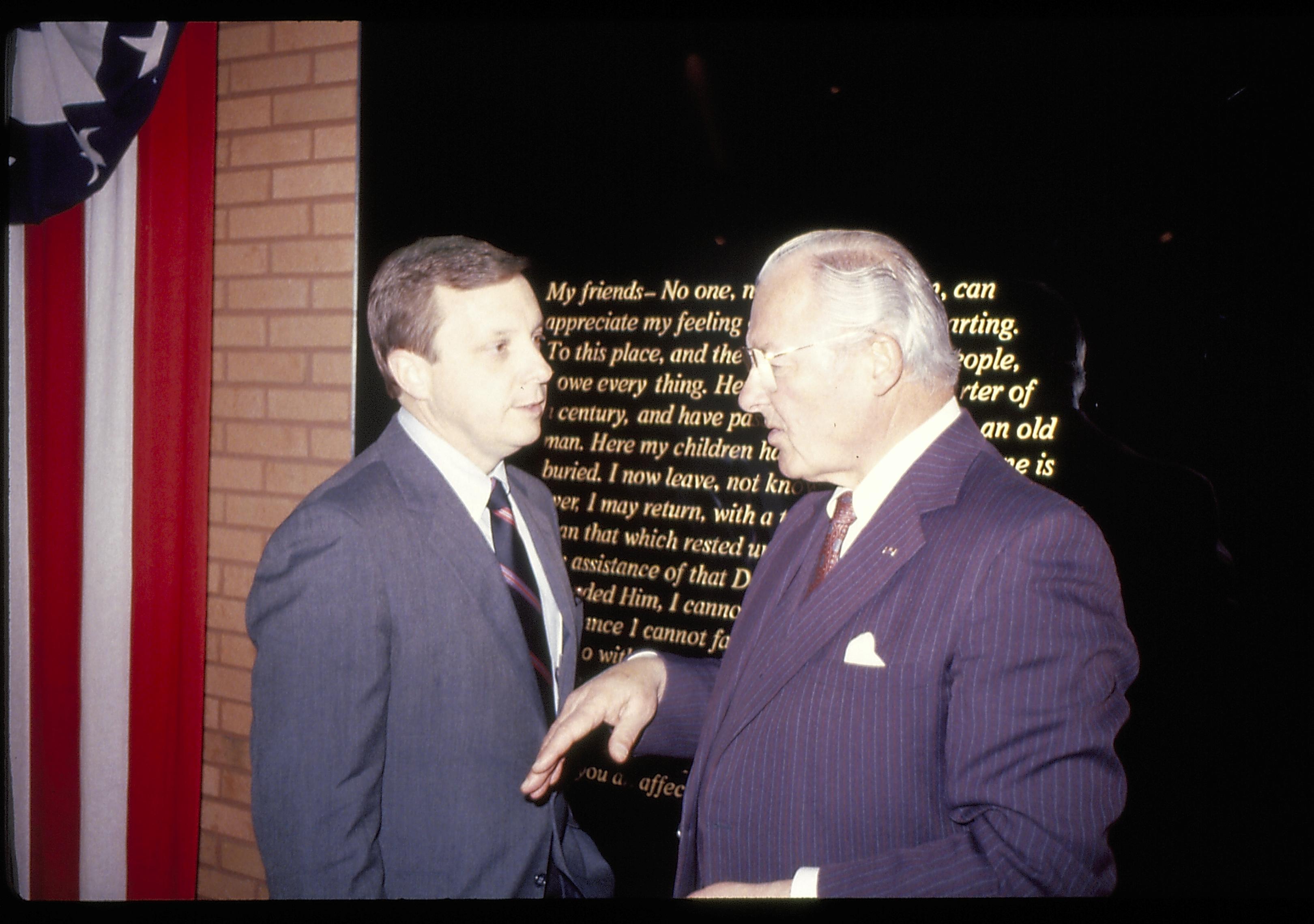 Two men conversing in front of Farewell address.  Lincoln Home NHS- VIP Findley and Michels Visit award, visit, reception