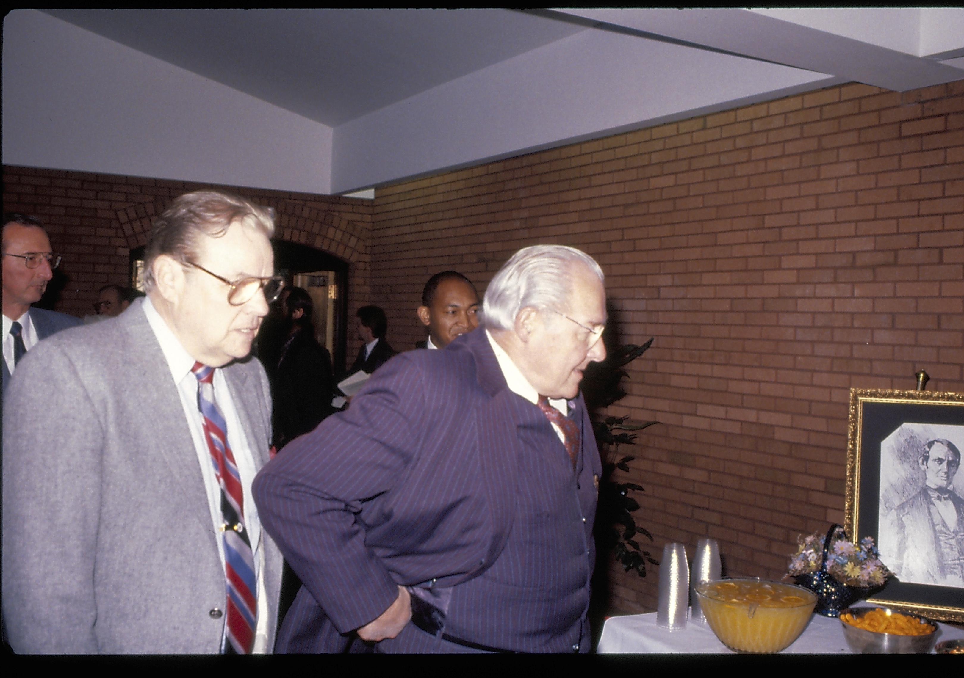 Two men looking at refreshment table. Lincoln Home NHS- VIP Findley and Michel Visit award, visit, reception