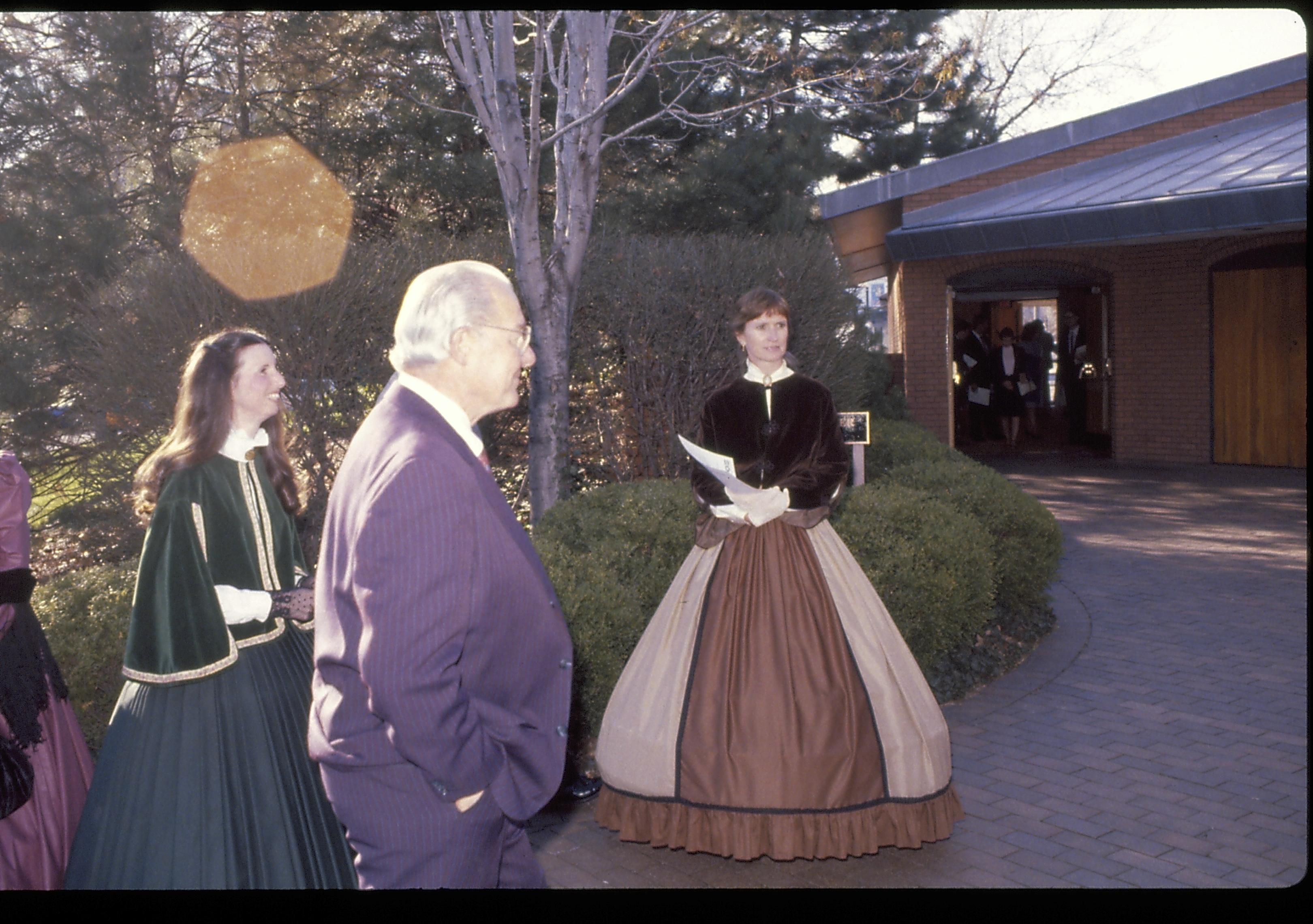 Two ladies in period dress and a man standing outside VC. Lincoln Home NHS- VIP Findley and Michel Visit award, visit, reception