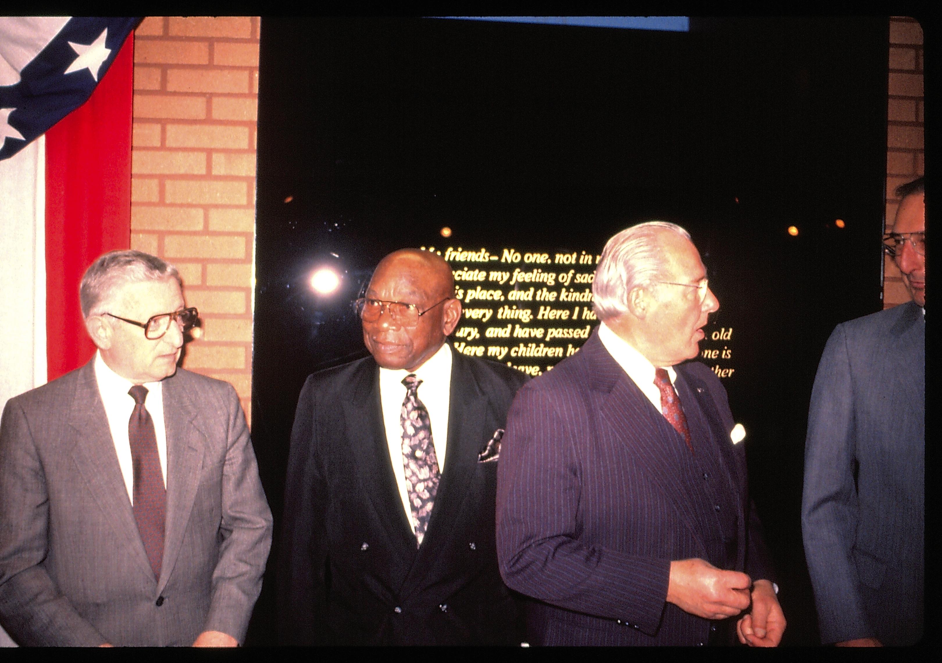 Four men standing in front of Farewell address. Lincoln Home NHS- VIP Findley and Michel Visit award, visit