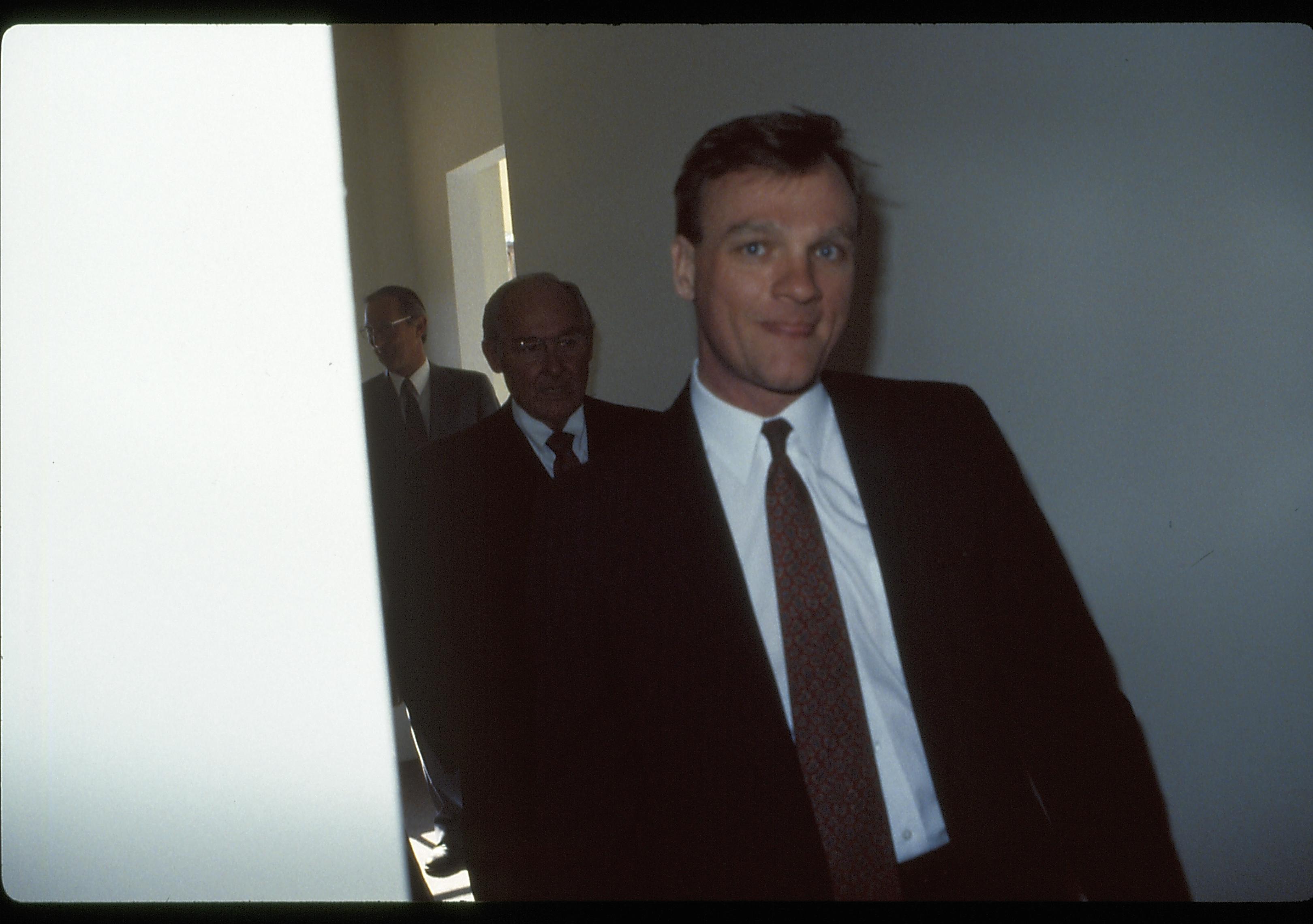 Men walking in hallway. Lincoln Home NHS- VIP Findley and Michel Visit award, visit, tour