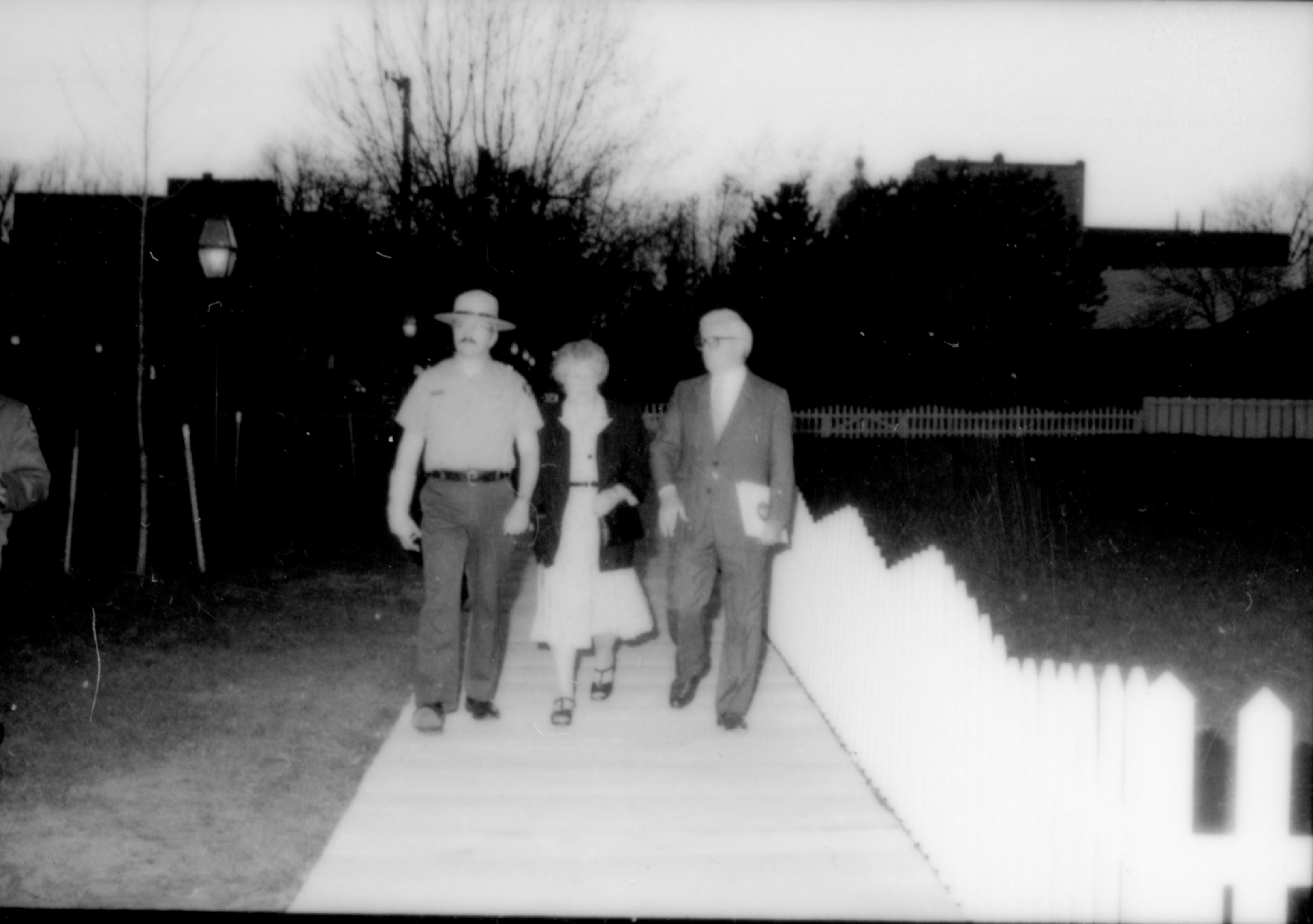 Ranger and two others walking down board walk. Lincoln Home NHS- Paul Findley and Michel VIP visit, 117 Finley, Michel, visit, tour