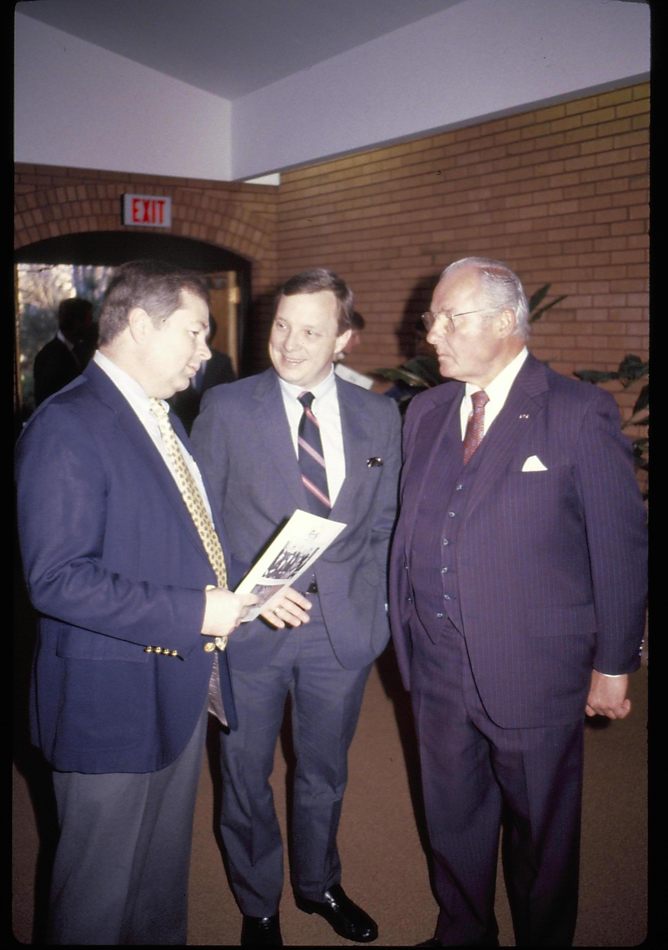 Three men standing, conversing in VC. Lincoln Home NHS- VIP Findley and Michel Visit award, visit, ceremony