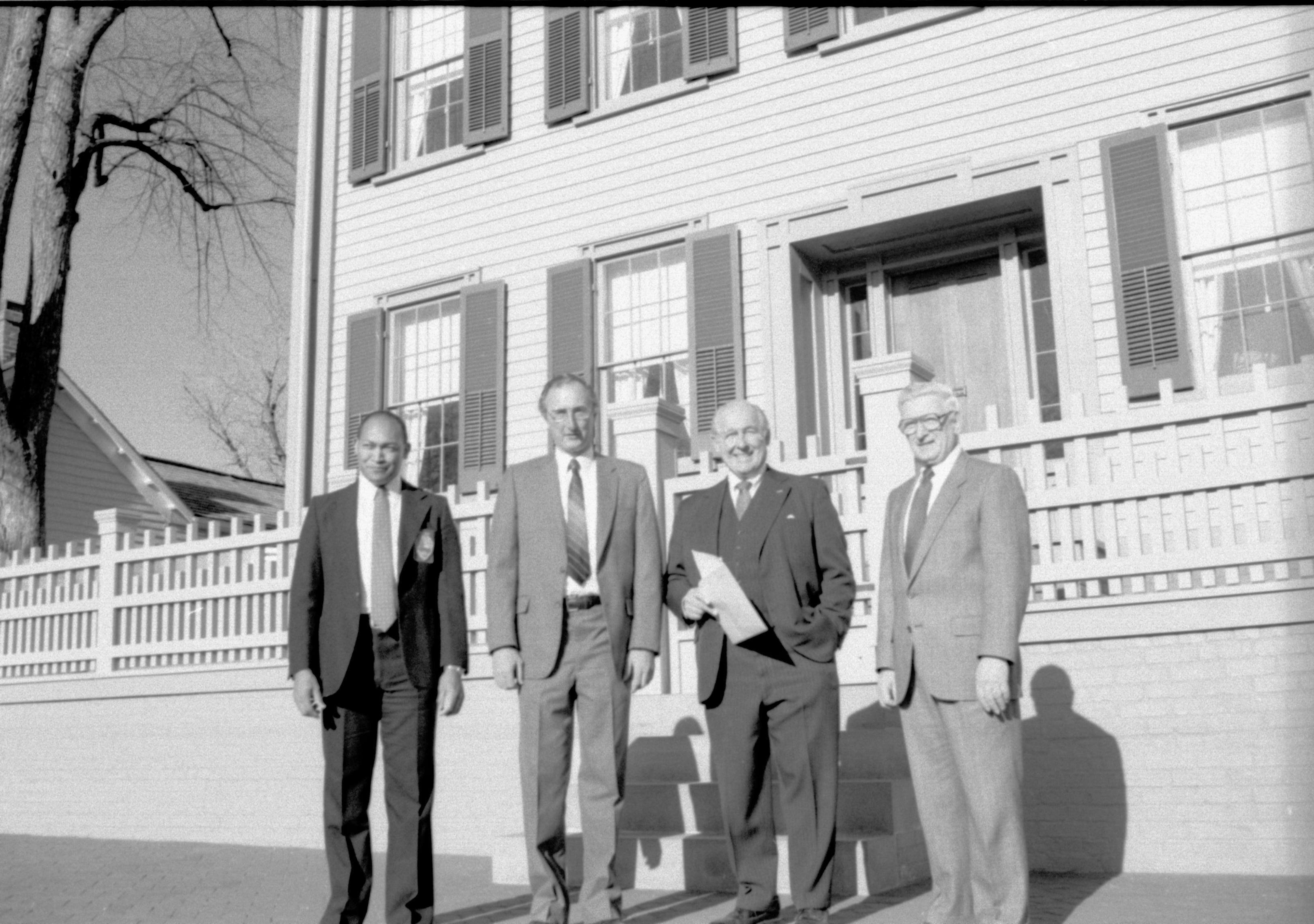 Four men standing in front of Home. Lincoln Home NHS- VIP Findley and Michel Visit, 66A award, visit, tour