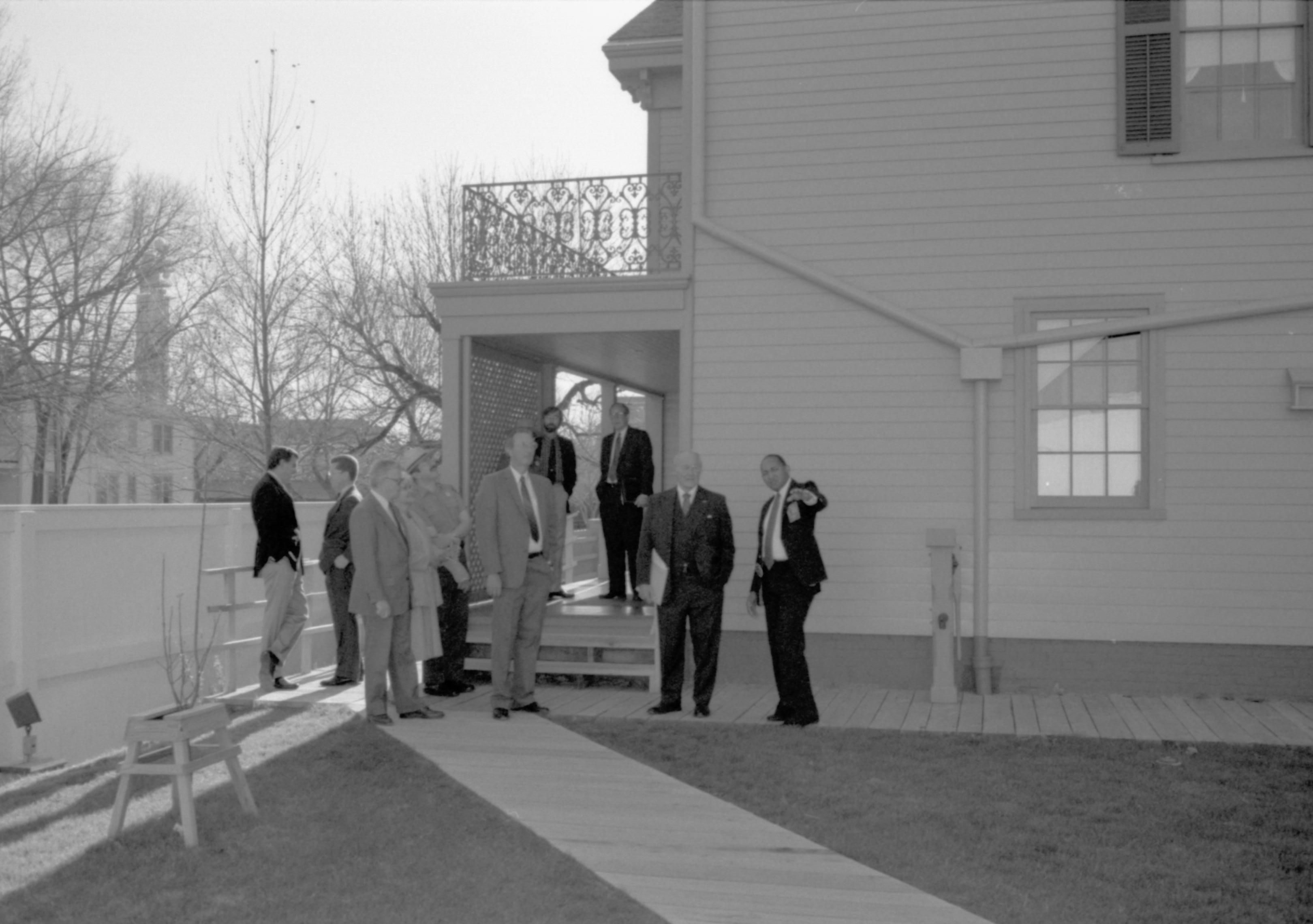 Group leaving Home from side porch.  Lincoln Home NHS- VIP Findley and Michel Visit, 65A award, visit, tour