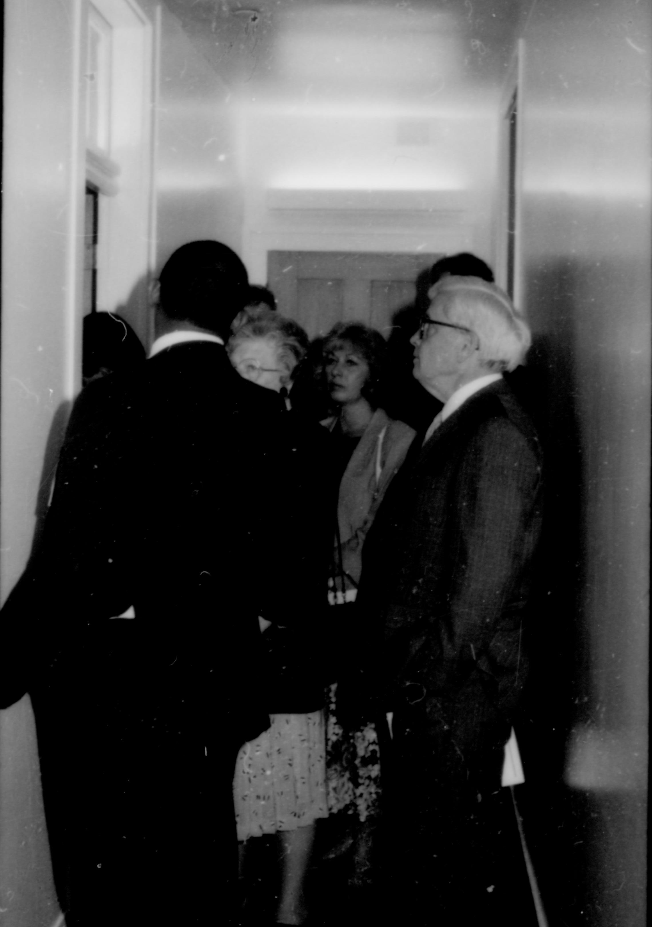 Crowd of people in hallway. Lincoln Home NHS- Paul Findley and Michel VIP visit, 117 Finley, Michel, visit, tour