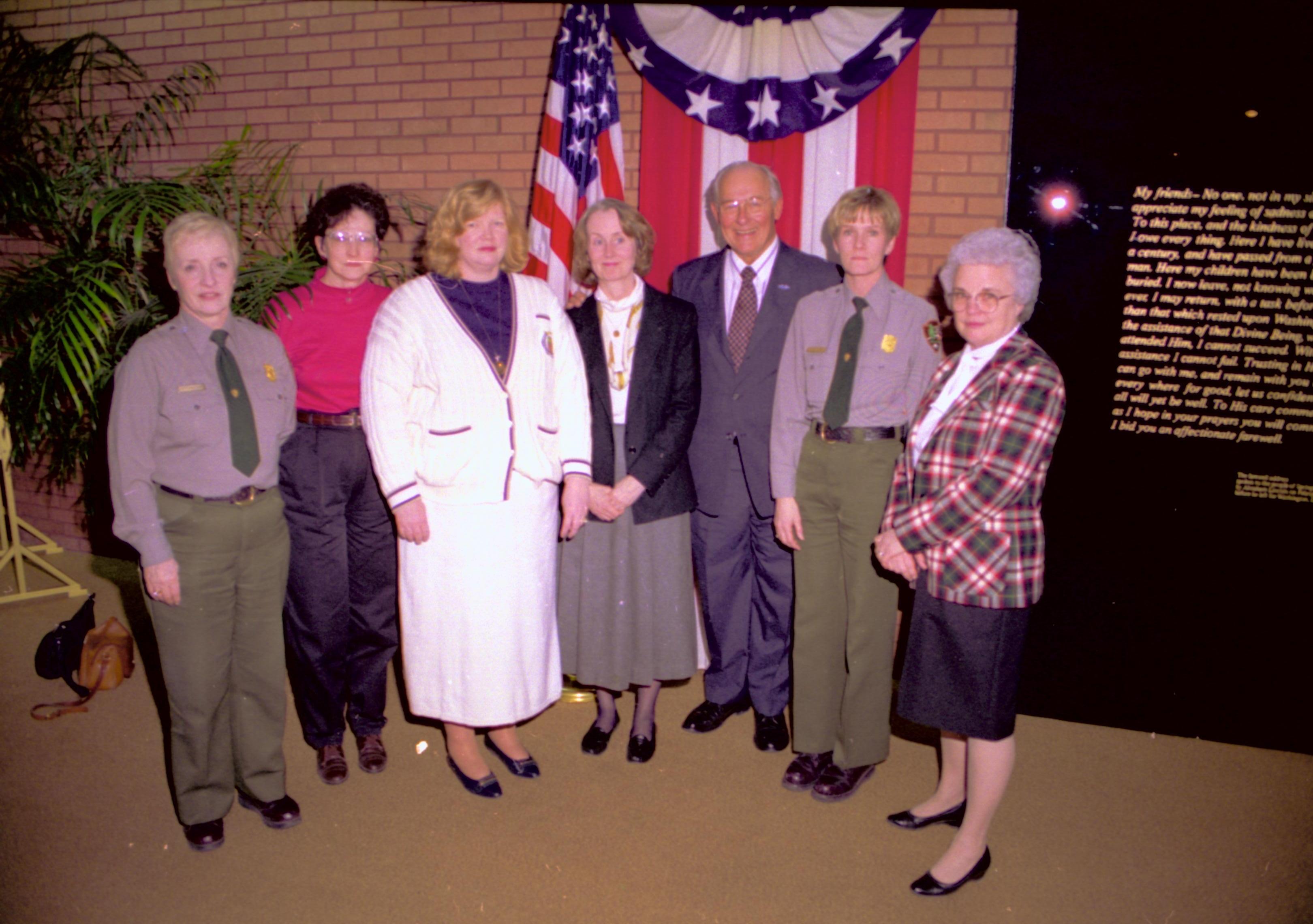 Group posing in front of American flag & bunting. Lincoln Home NHS- VIP Findley and Michel Visit to Lincoln Home visit, program