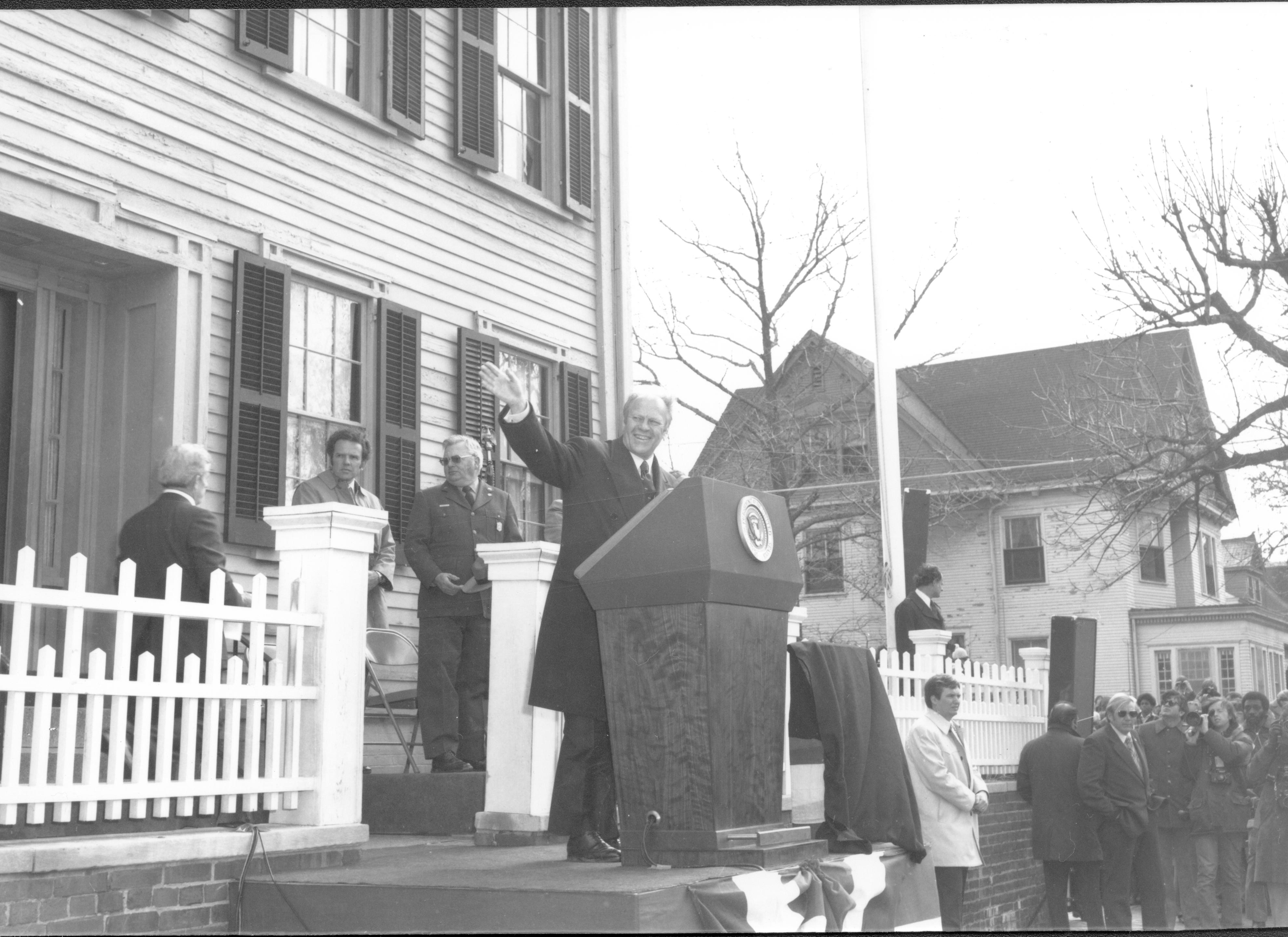 Man waving at podium in front of Lincoln Home. Lincoln Home NHS- President Ford and Visitor Center Corner Stone President, Ford, visit