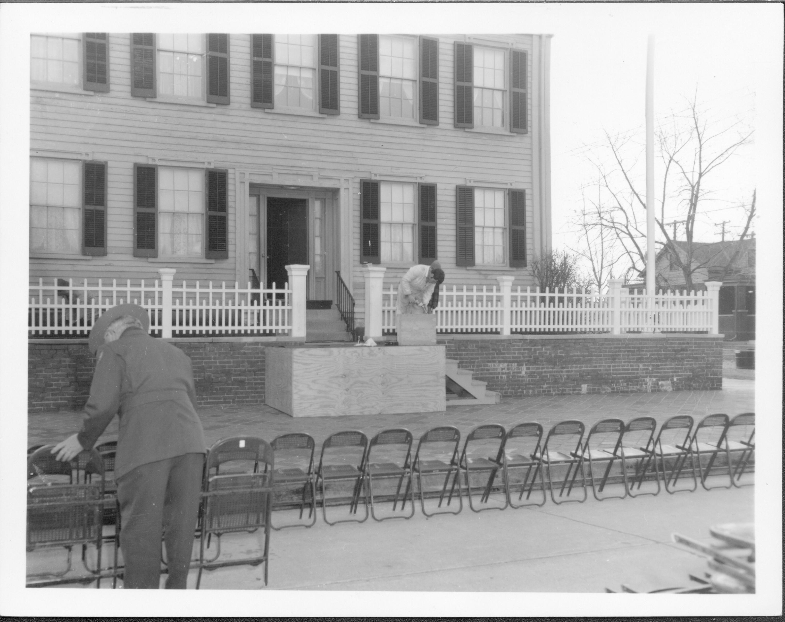 Supt. Al Banton setting up chairs for President Ford trip Lincoln Home NHS- President Ford and V.C. Corner Stone, neg #32 class 1000, class 8 pic 32, 142 President, Ford, visit