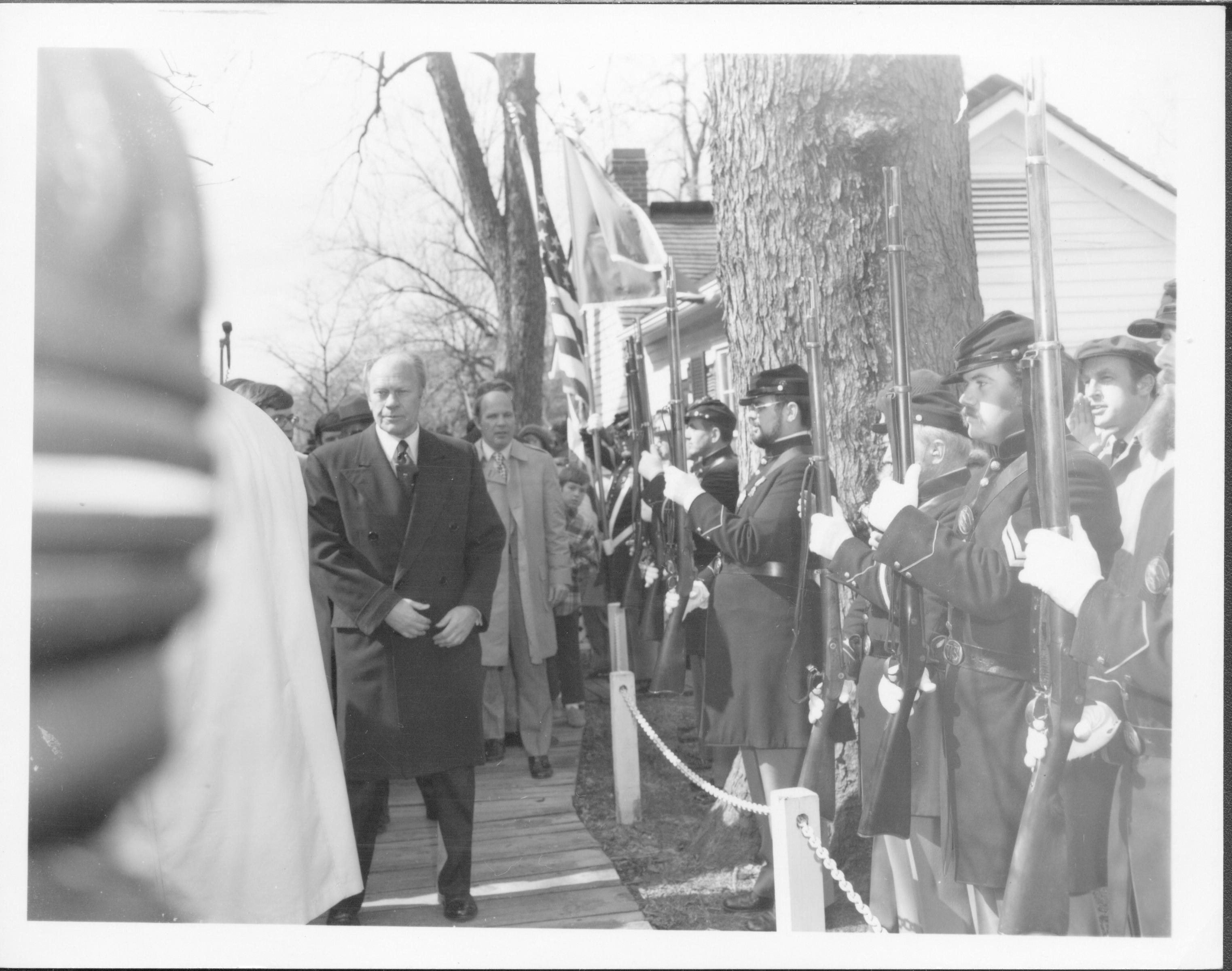 President Ford to Lincoln Home, north side of home walking past 114th Regiment Lincoln Home NHS- President Ford and V.C. Corner Stone, neg #28 class 1000, class 8 pic 38, 138 President, Ford, visit