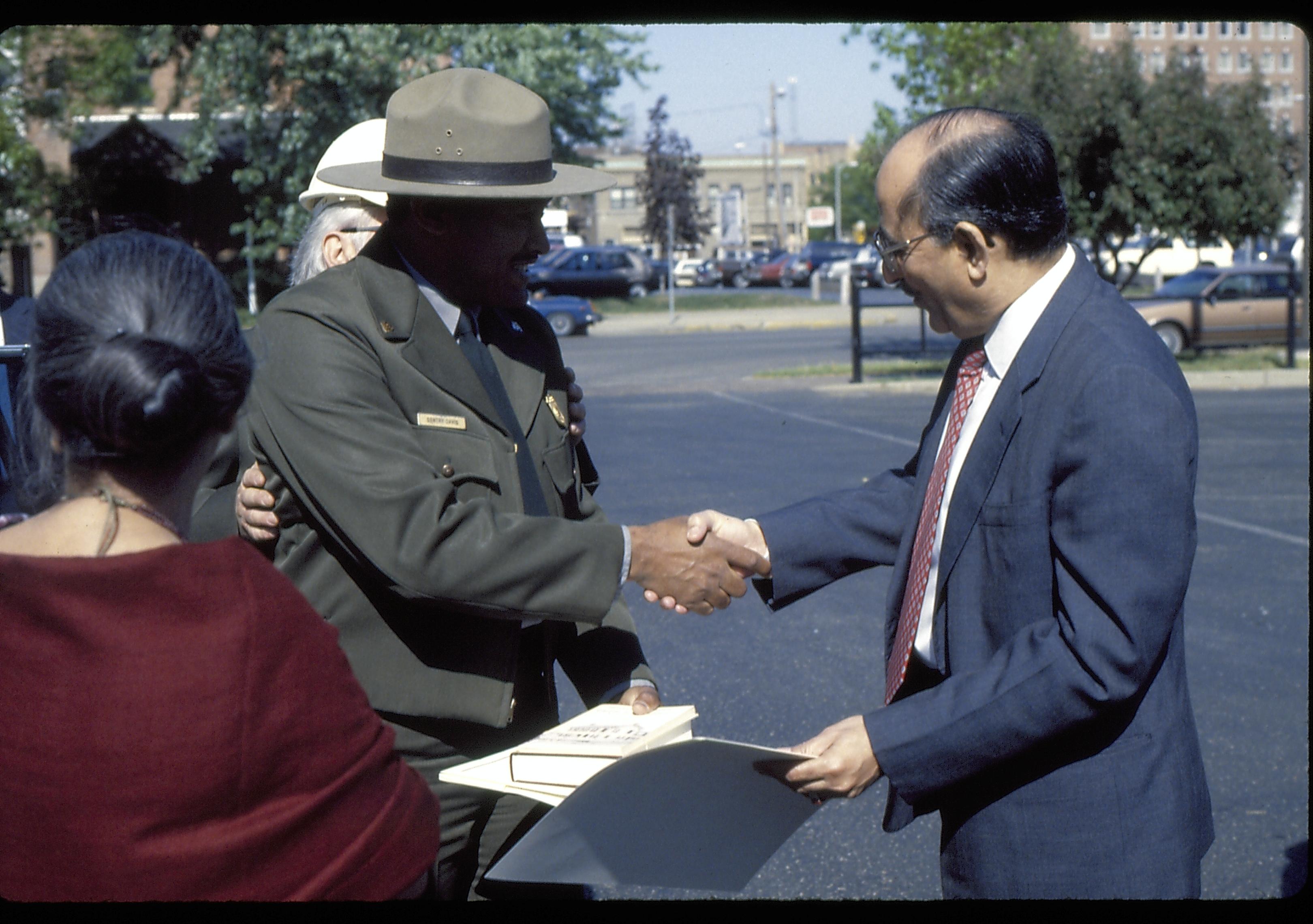 Ranger shaking hands with man. Lincoln Home NHS- Foreign Dignitary Visit dignitary, visit, tour