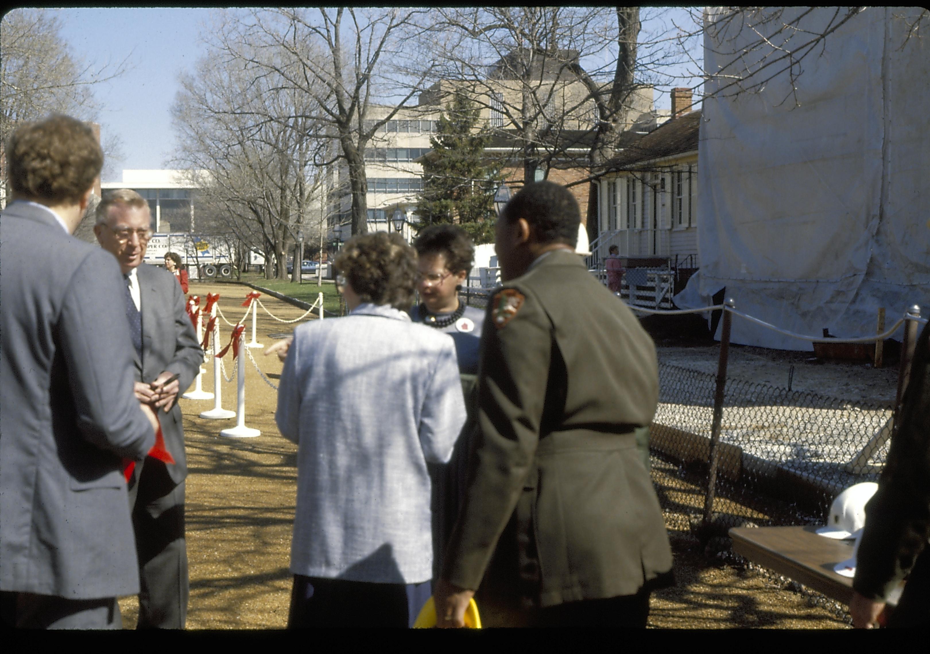 Group standing in street by fenced off area of home. Lincoln Home NHS- Foreign Dignitary Visit dignitary, visit, tour