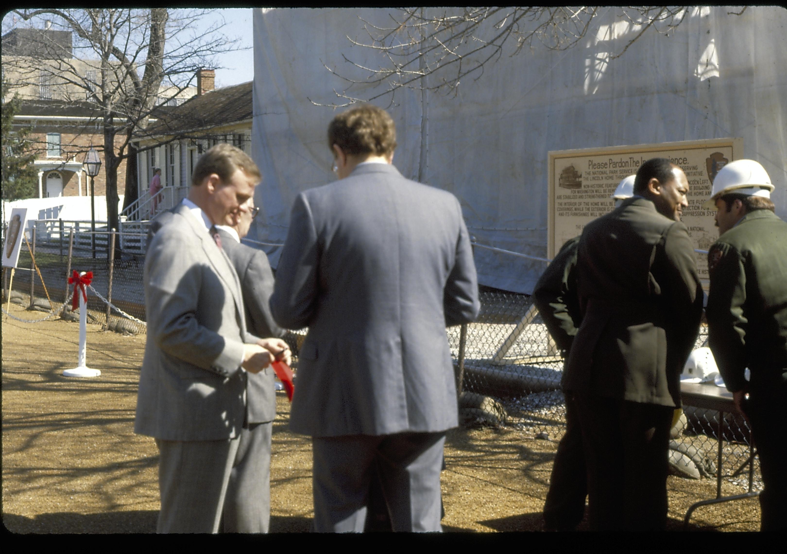 Group standing in street by fenced off area of home. Lincoln Home NHS- Foreign Dignitary Visit dignitary, visit, tour