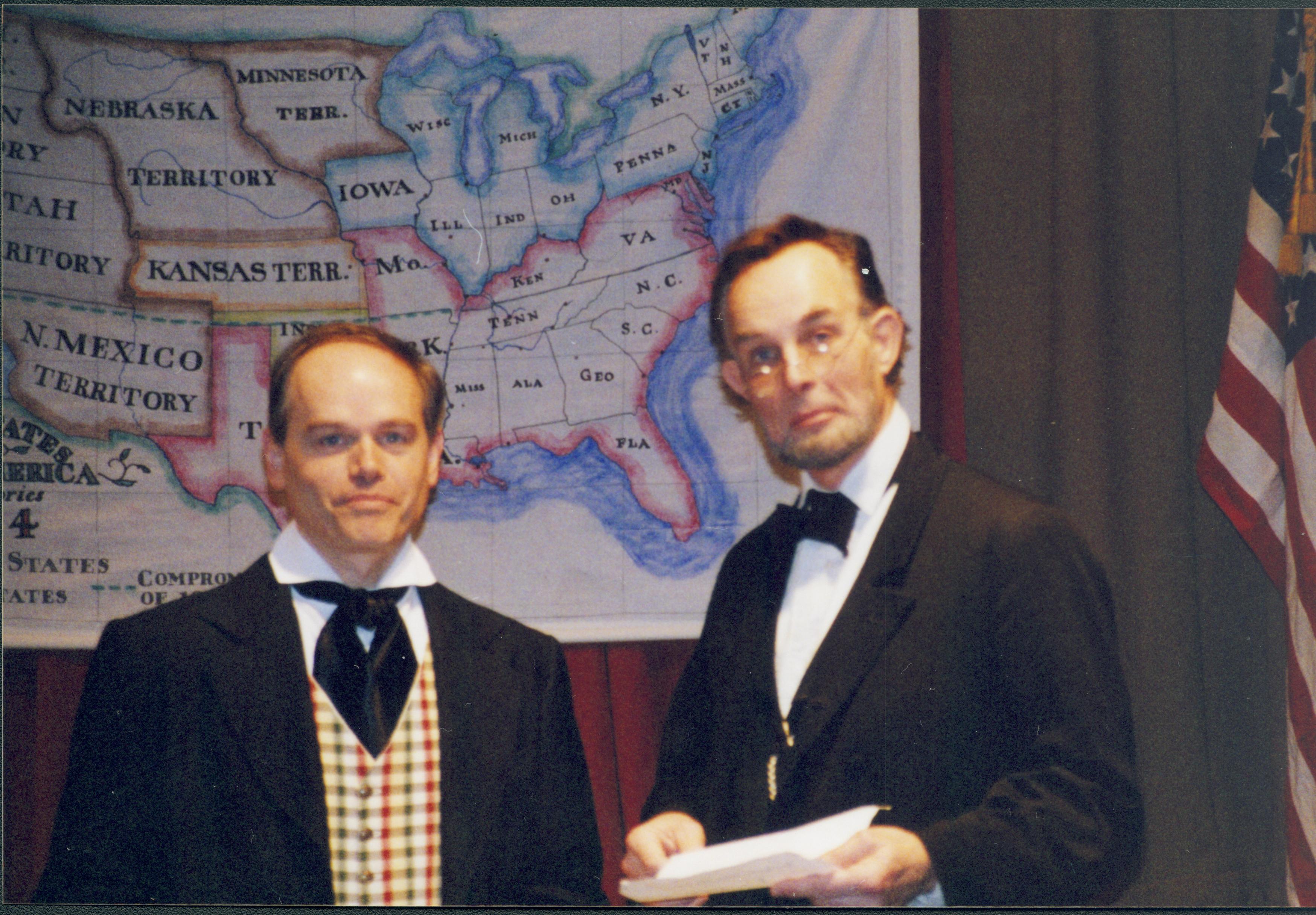 Two men in front of map Lincoln Home NHS- Fritz Klein and Drew Gibson visit, roll 2002-1, exp 15 Klein, Gibson, visit