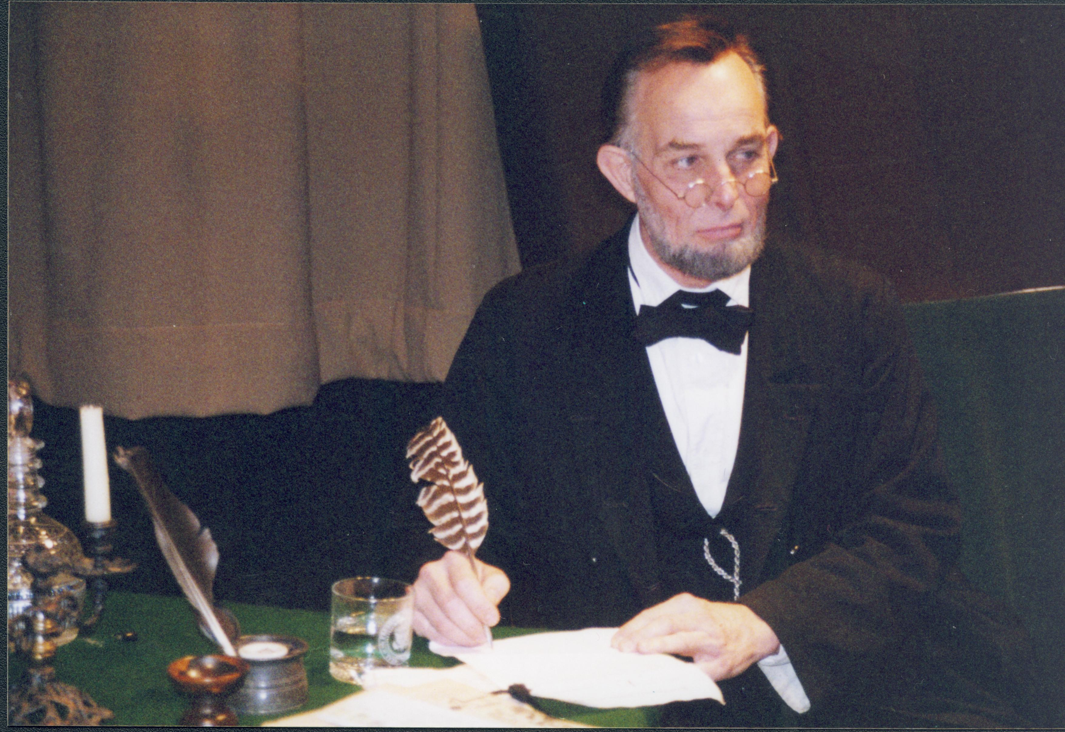 Fritz Klein writing a letter Lincoln Home NHS- Fritz Klein and Drew Gibson visit, roll 2002-1, exp 23 Klein, Gibson, visit