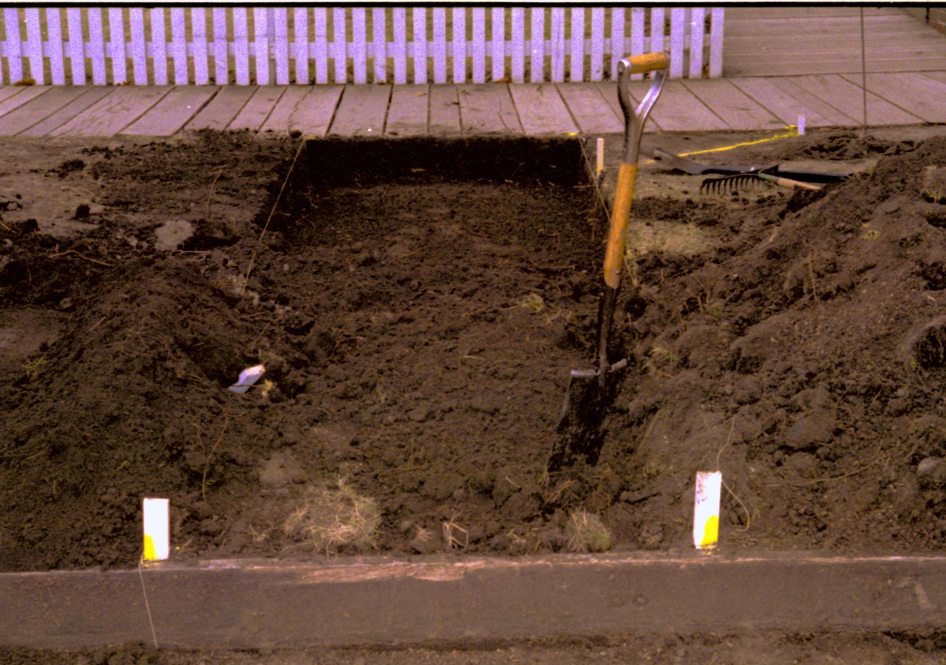 Sidewalk being installed. Lincoln Home NHS- Fritz Klein and Drew Gibson visit, roll 2002-1 tractor, repairs, excavation