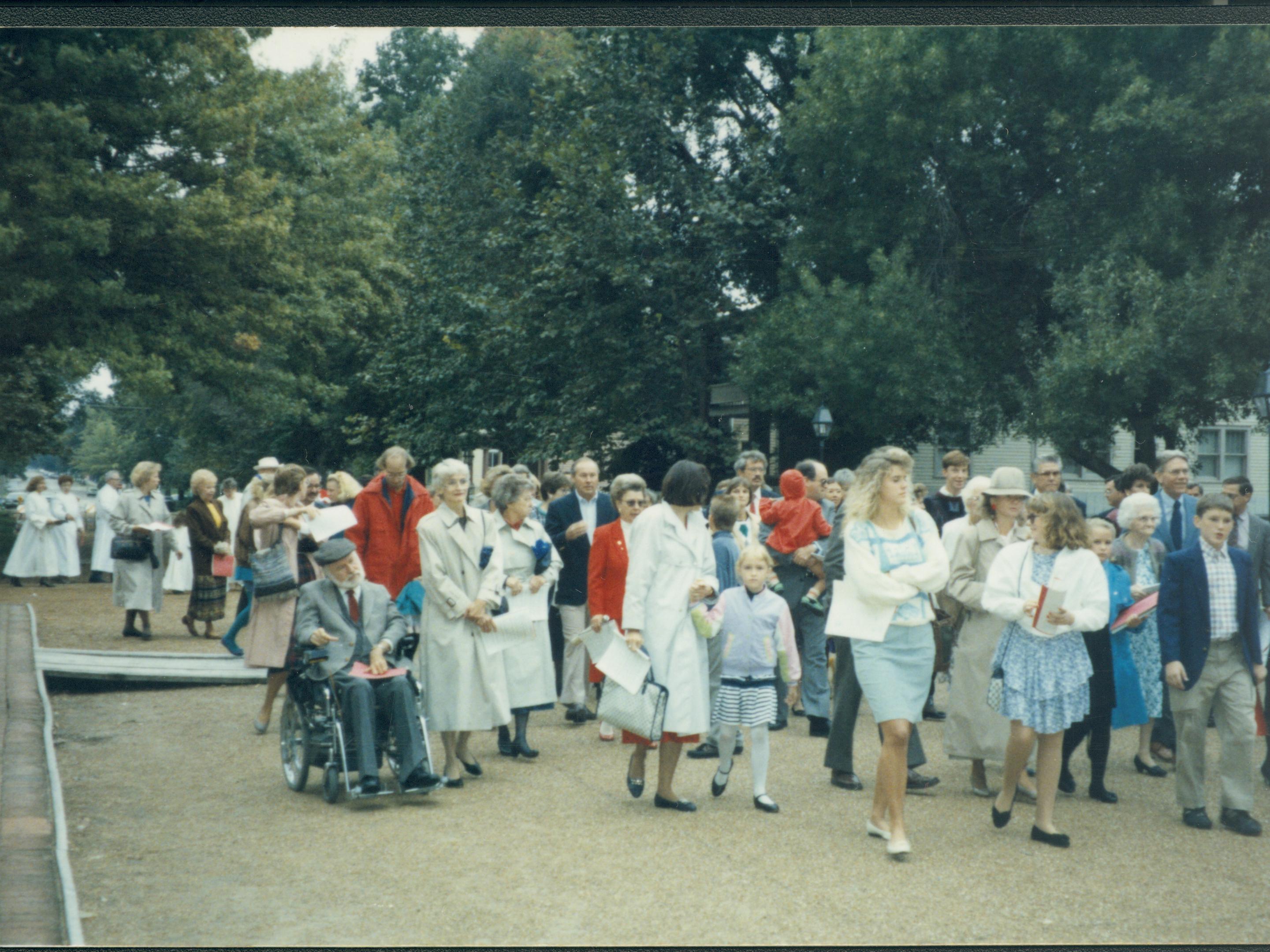 Group of people walking down street Lincoln Home NHS- Grace Lutheran Service service, Grace, Lutheran