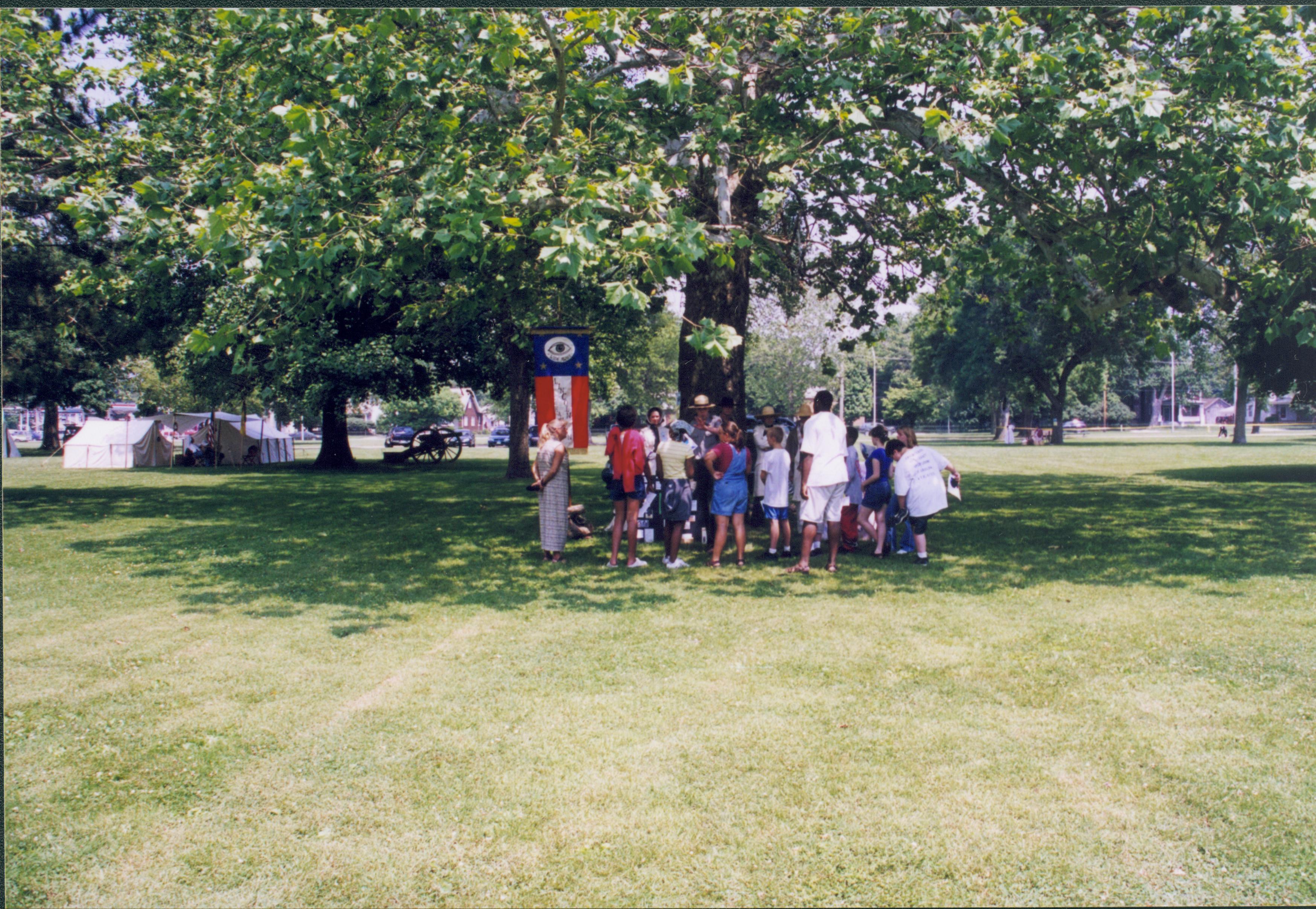 Children standing under tree with Ranger. Lincoln Home NHS- Grierson Days Jacksonville Grierson, Jacksonville, celebration