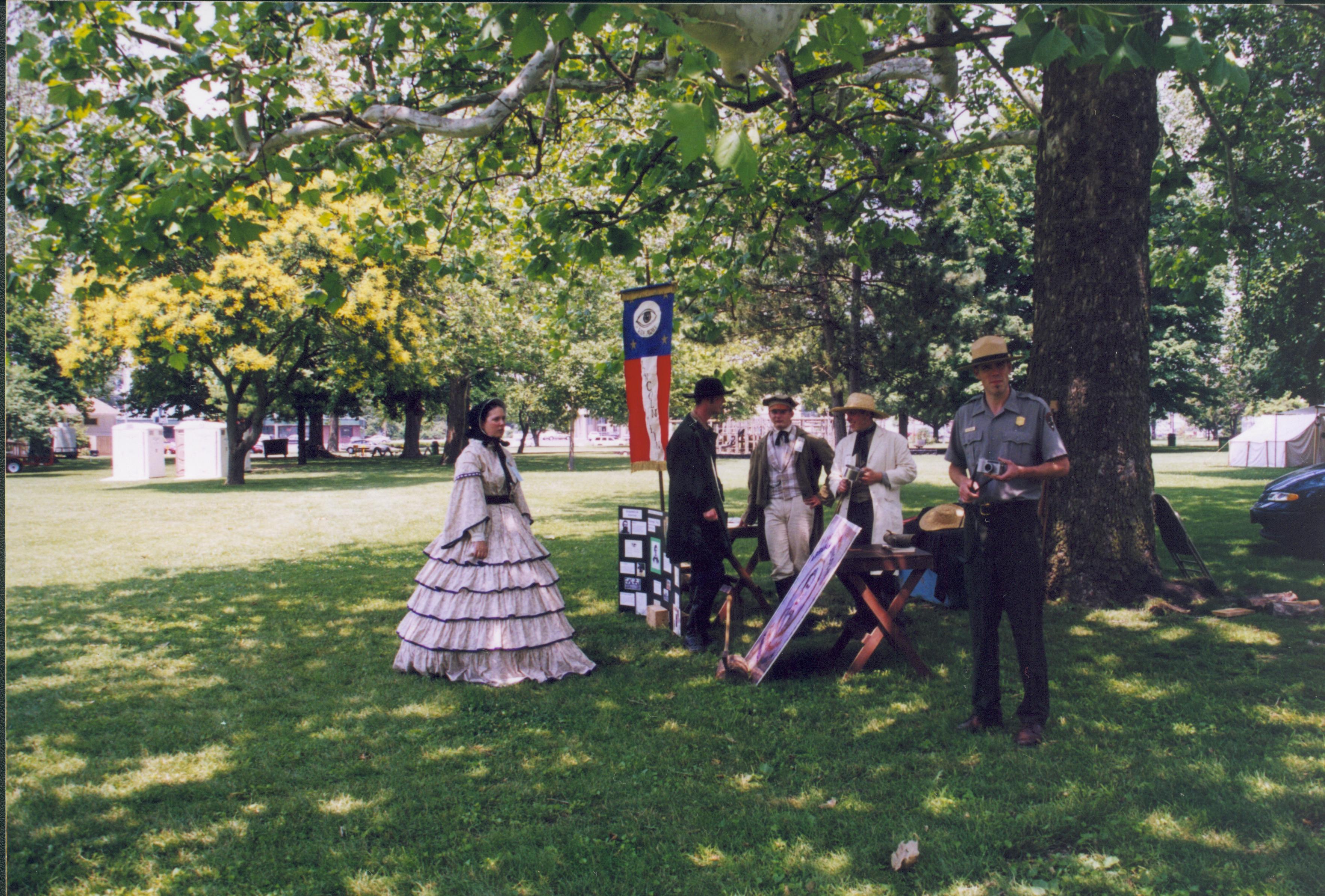 People in period dress with exhibit. Lincoln Home NHS- Grierson Days Jacksonville Grierson, Jacksonville, celebration