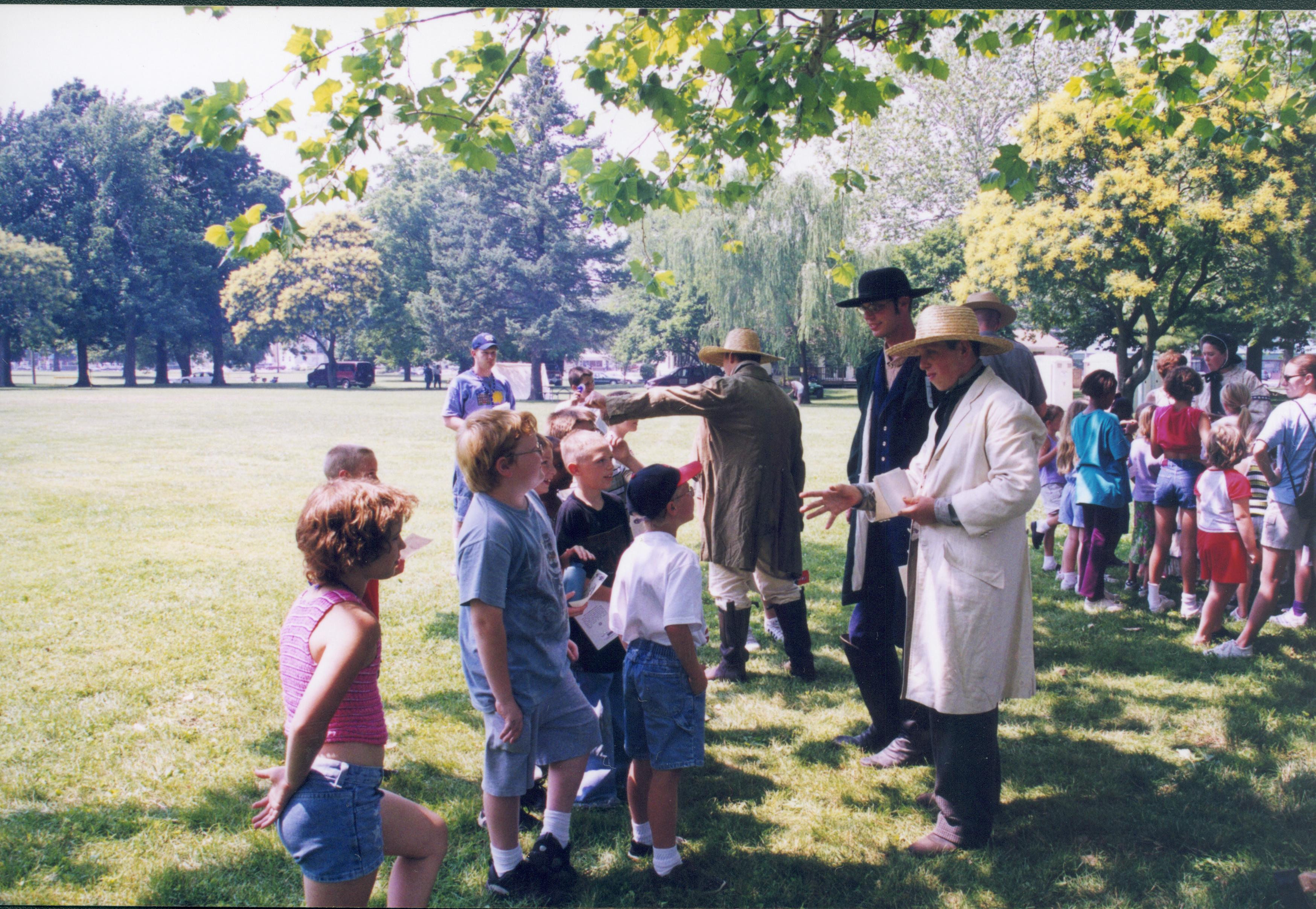 Children talking to people in period dress. Lincoln Home NHS- Grierson Days Jacksonville Grierson, Jacksonville, celebration