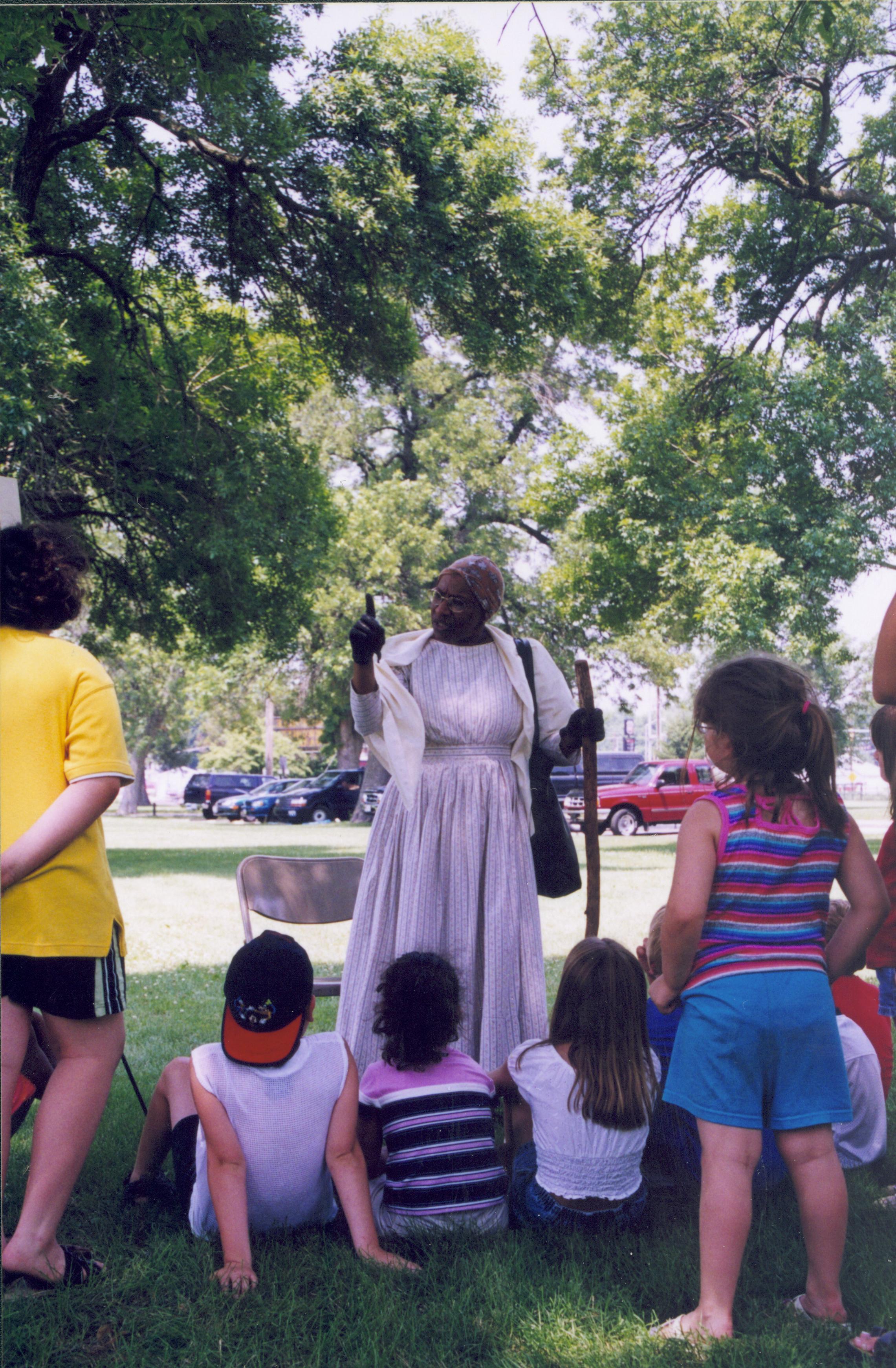 Children listening to lady in period dress. Lincoln Home NHS- Grierson Days Jacksonville Grierson, Jacksonville, celebration