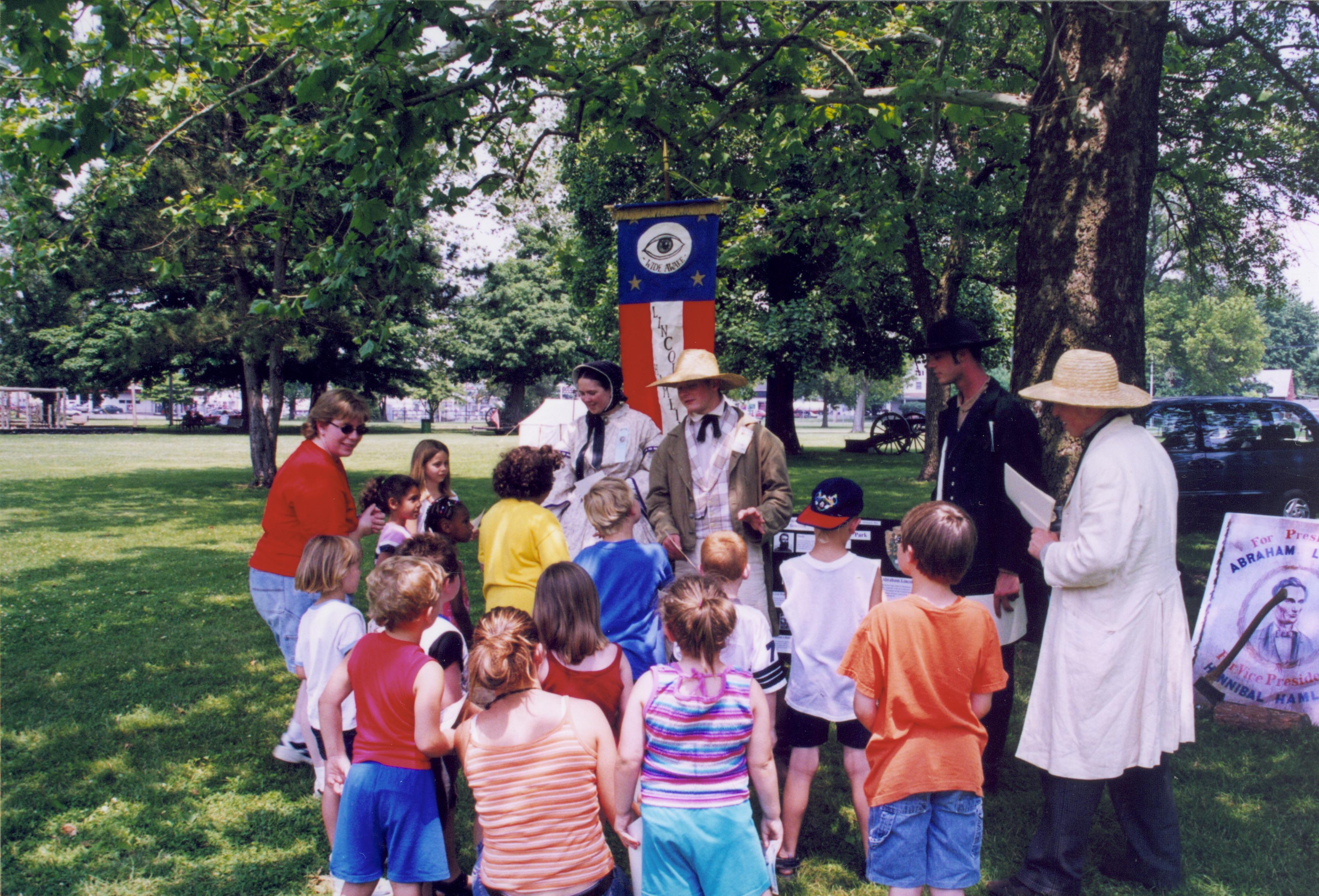 Children gathering around people in period dress. Lincoln Home NHS- Grierson Days Jacksonville Grierson, Jacksonville, celebration