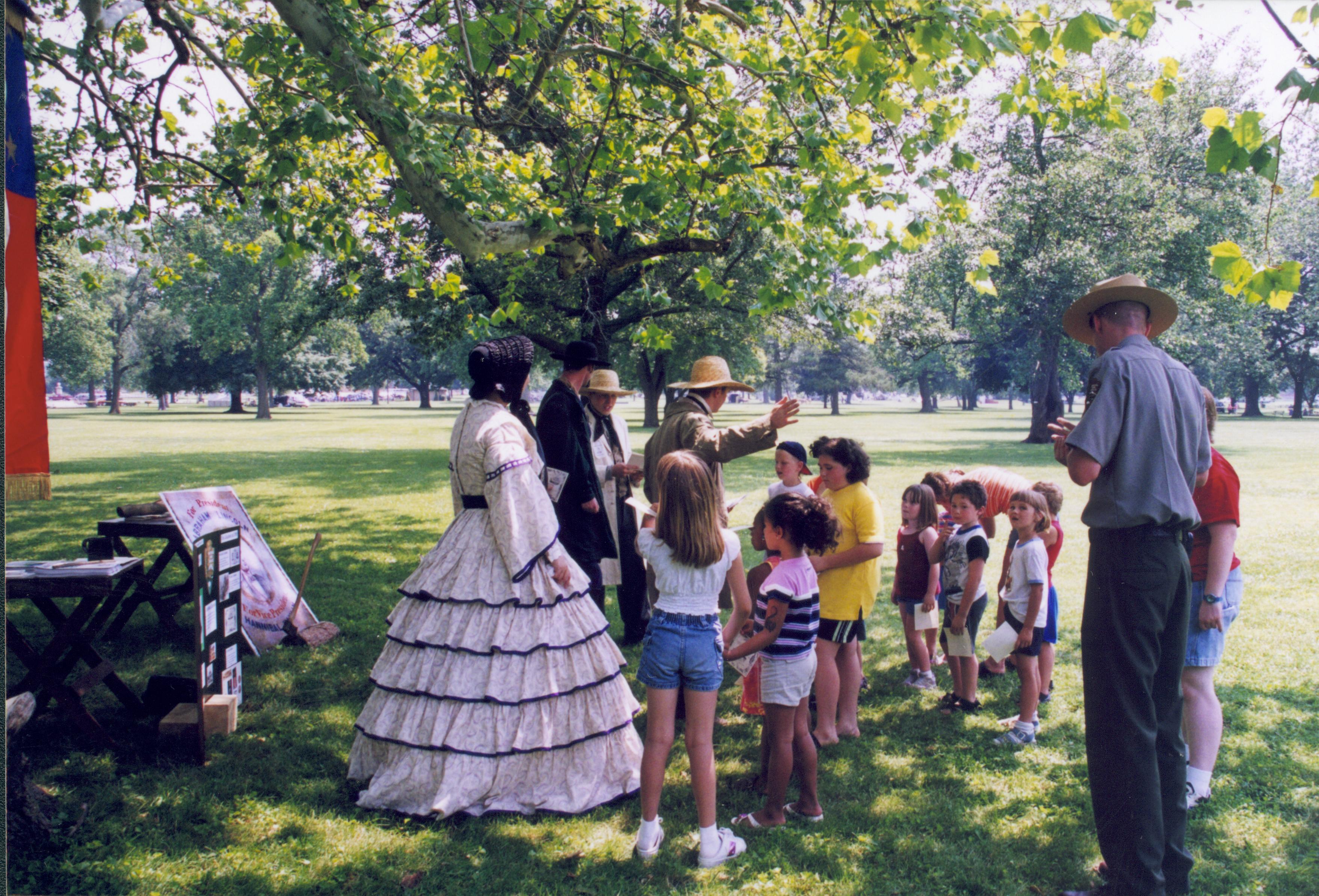 Children listen to people in period dress (and Ranger). Lincoln Home NHS- Grierson Days Jacksonville Grierson, Jacksonville, celebration