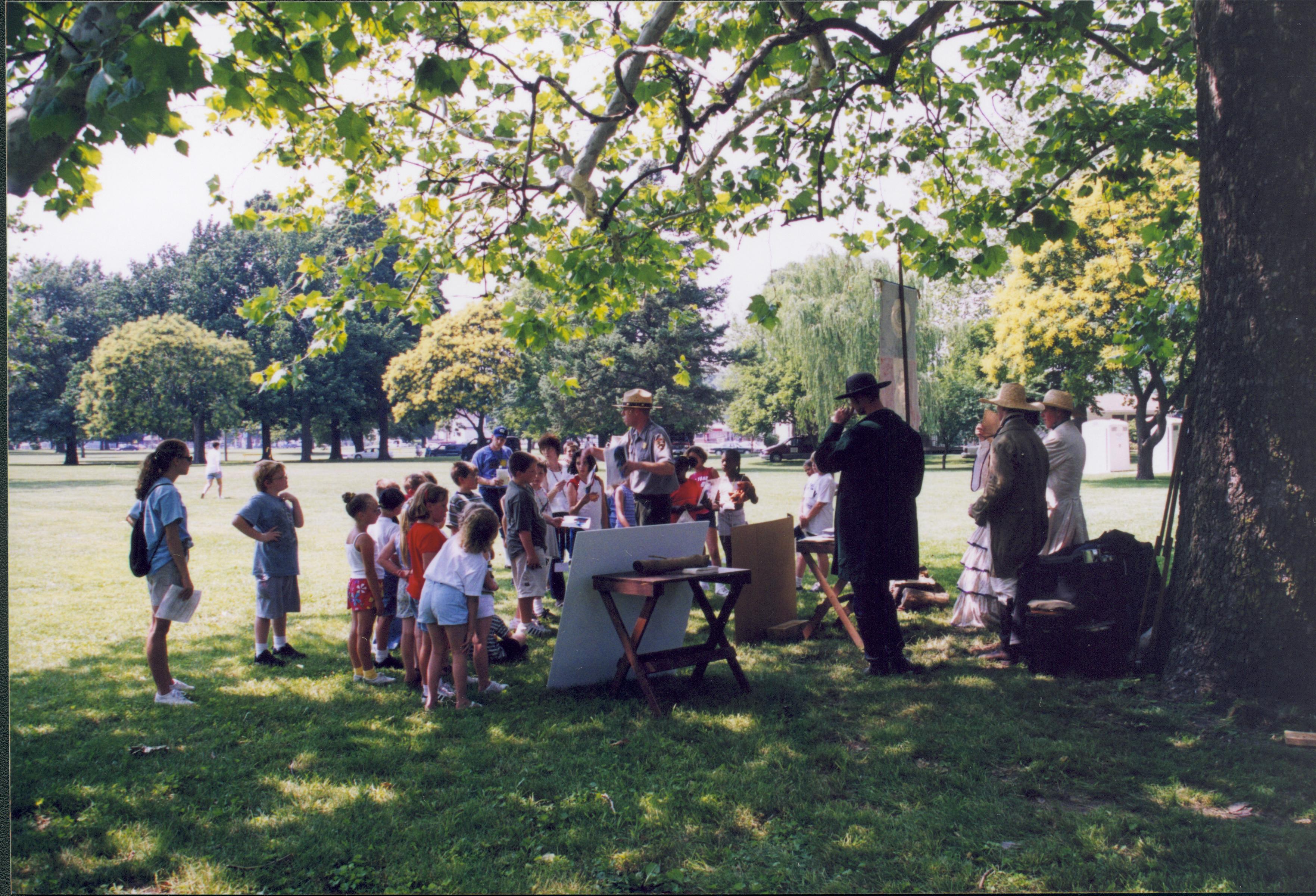 Ranger speaking to group of children in park. Lincoln Home NHS- Grierson Days Jacksonville Grierson, Jacksonville, celebration