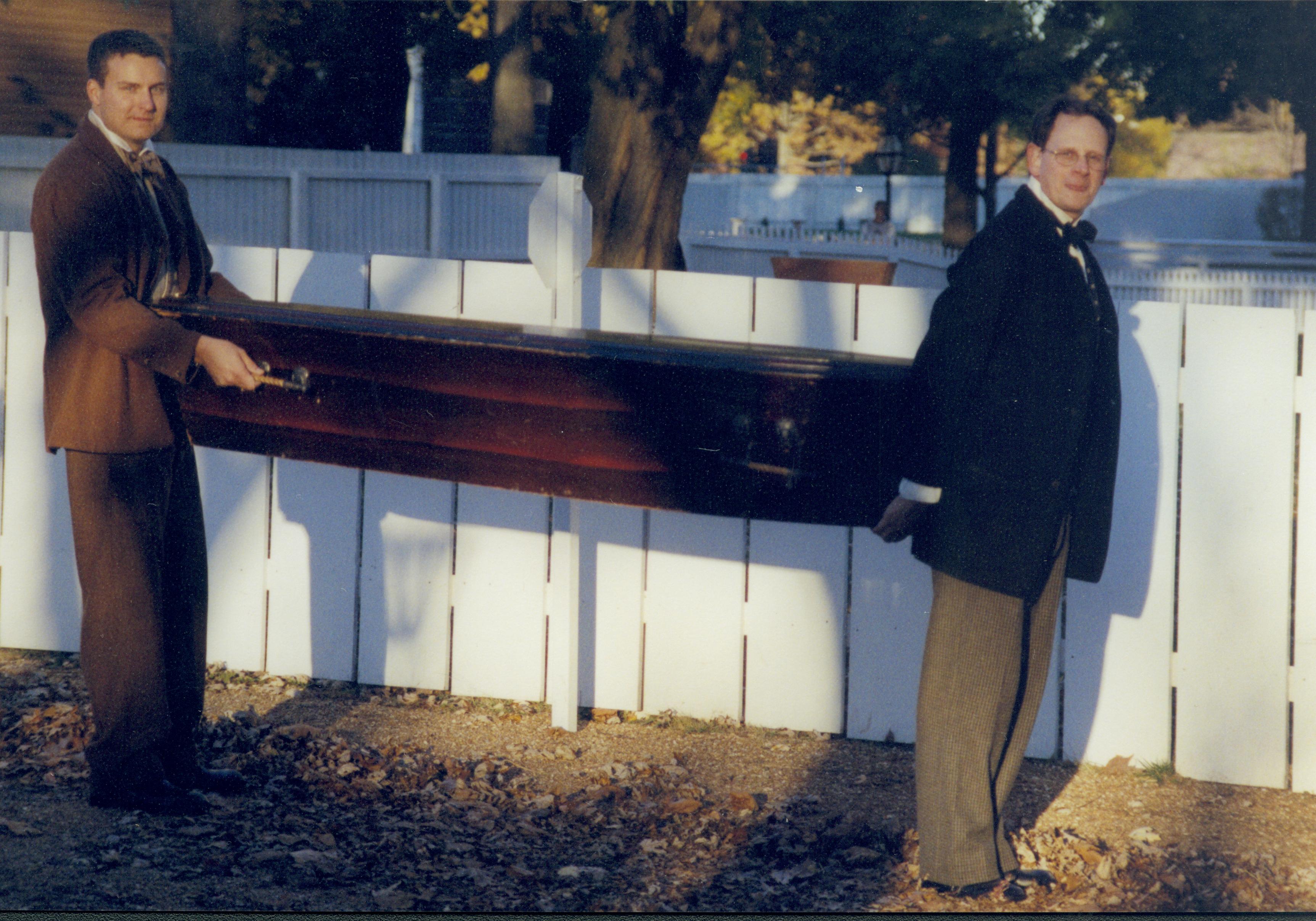 Two men holding a casket. Lincoln Home NHS- Halloween halloween, costumes, decorations