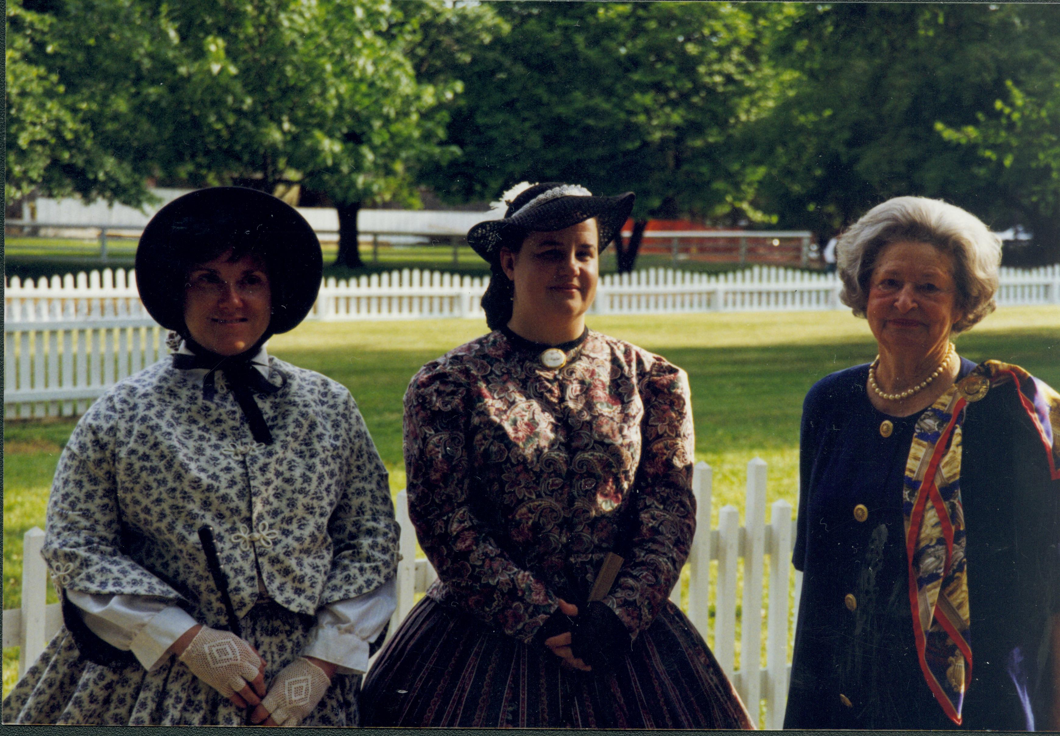 Three ladies (two in period dress) Lincoln Home NHS- Lady Bird Johnson visit, roll #1 neg #20 Johnson, visit, tour