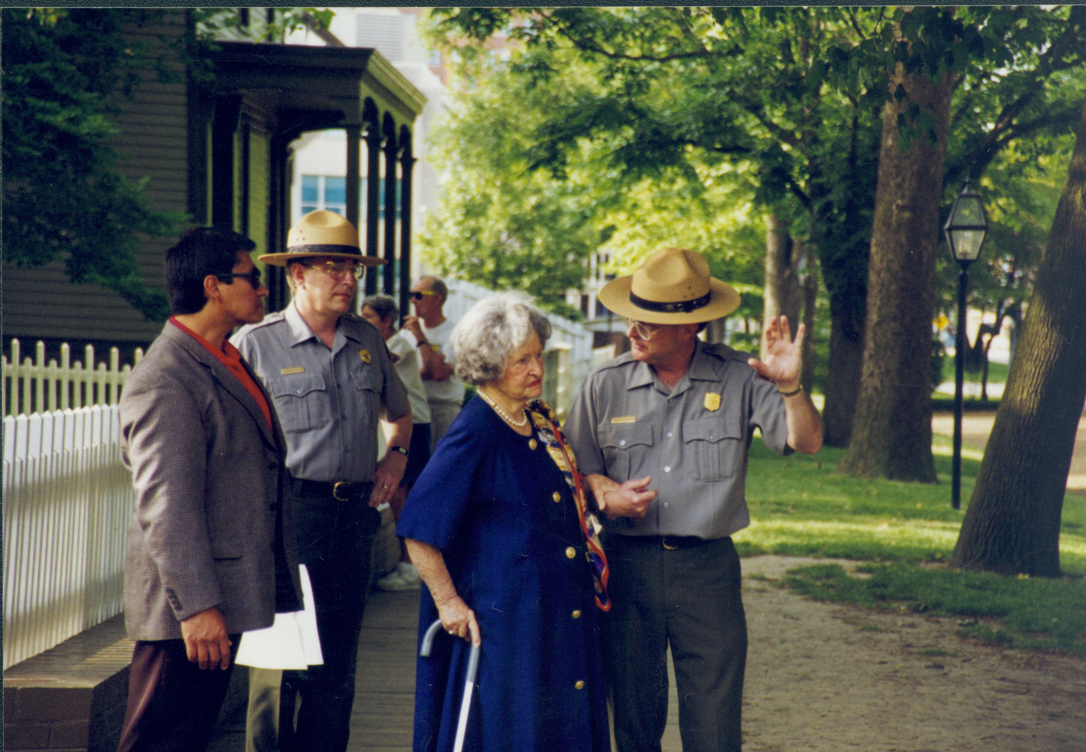 Two rangers and two visitors Lincoln Home NHS- Lady Bird Johnson visit, roll #1 neg #23 Johnson, visit, tour